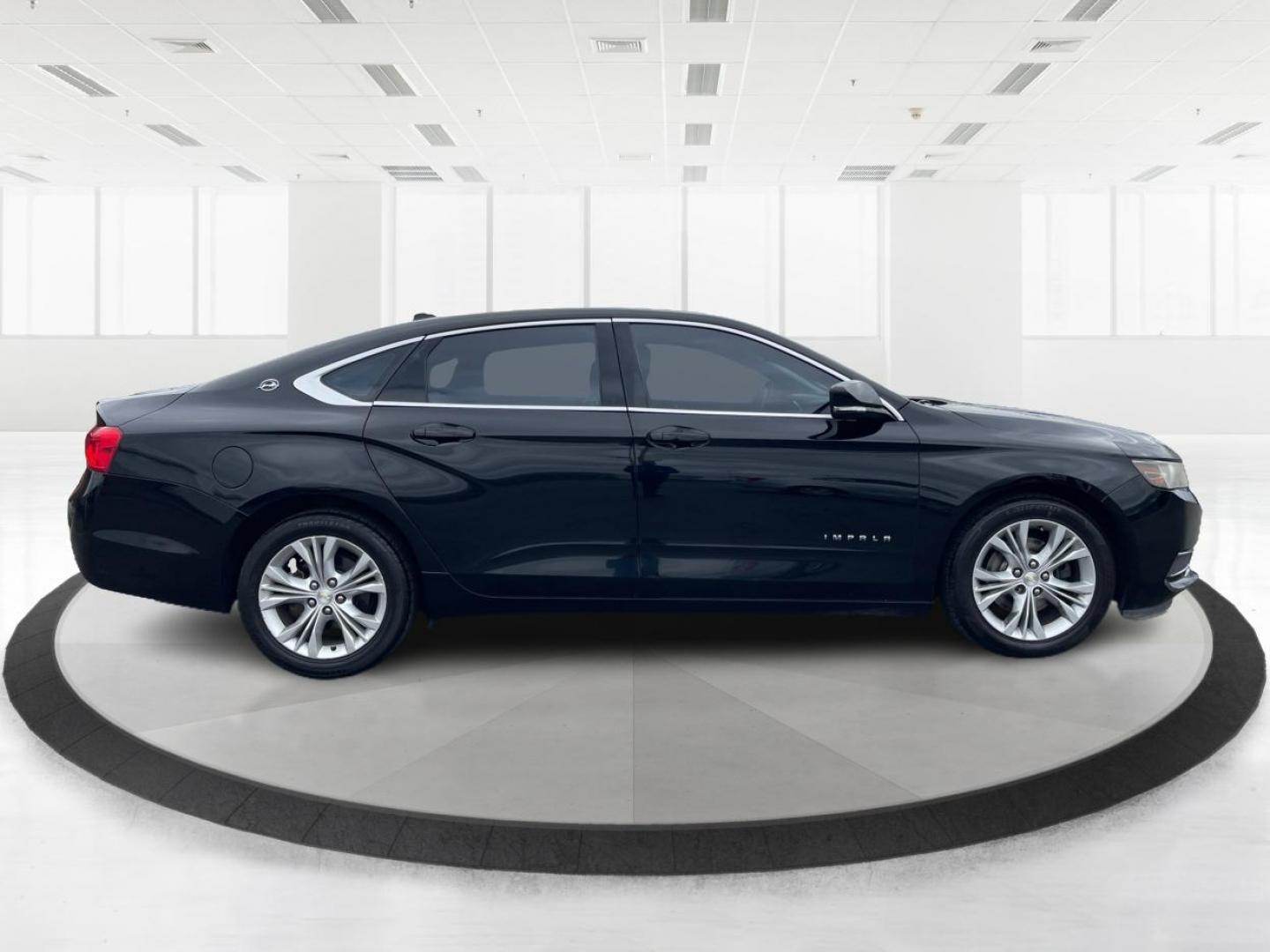 2014 Black Chevrolet Impala 2LT (2G1125S32E9) with an 3.6L V6 DOHC 24VV FFV engine, 6-Speed Automatic transmission, located at 1099 N County Rd 25A , Troy, OH, 45373, (937) 908-9800, 40.057079, -84.212883 - 2014 Chevrolet Impala 2LT - Photo#1