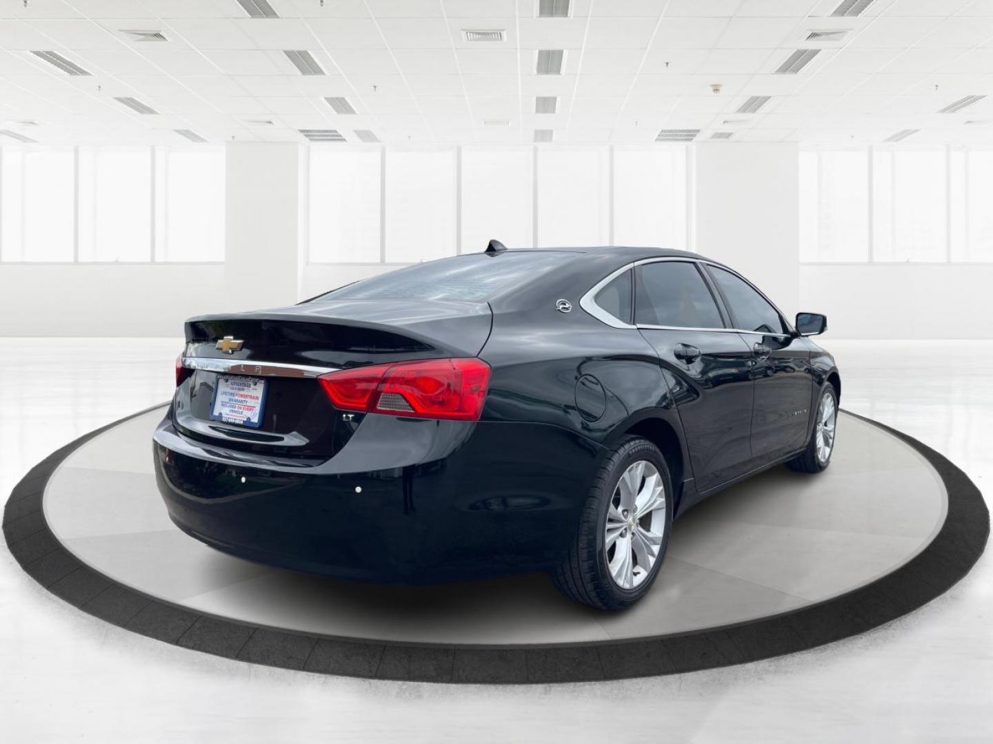 2014 Black Chevrolet Impala 2LT (2G1125S32E9) with an 3.6L V6 DOHC 24VV FFV engine, 6-Speed Automatic transmission, located at 1099 N County Rd 25A , Troy, OH, 45373, (937) 908-9800, 40.057079, -84.212883 - 2014 Chevrolet Impala 2LT - Photo#2