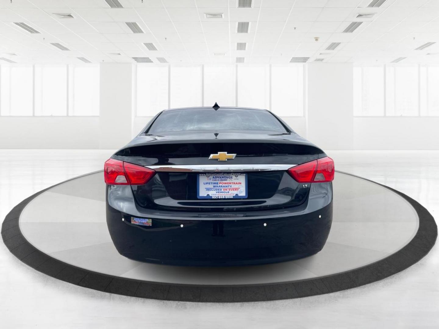2014 Black Chevrolet Impala 2LT (2G1125S32E9) with an 3.6L V6 DOHC 24VV FFV engine, 6-Speed Automatic transmission, located at 1099 N County Rd 25A , Troy, OH, 45373, (937) 908-9800, 40.057079, -84.212883 - 2014 Chevrolet Impala 2LT - Photo#3