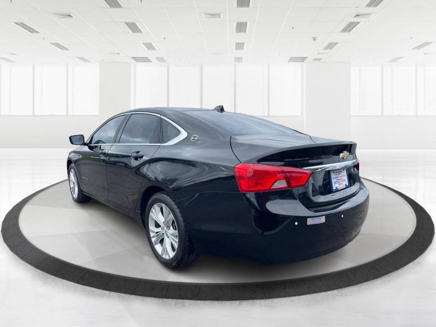 2014 Black Chevrolet Impala 2LT (2G1125S32E9) with an 3.6L V6 DOHC 24VV FFV engine, 6-Speed Automatic transmission, located at 1099 N County Rd 25A , Troy, OH, 45373, (937) 908-9800, 40.057079, -84.212883 - 2014 Chevrolet Impala 2LT - Photo#4