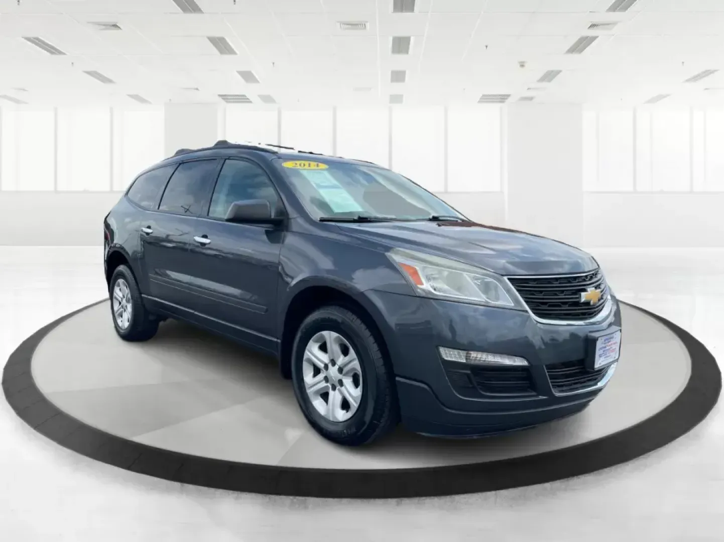 2014 Cyber Gray Metallic Chevrolet Traverse LS FWD w/PDC (1GNKRFED9EJ) with an 3.6L V6 DOHC 24V engine, 6-Speed Automatic transmission, located at 880 E. National Road, Vandalia, OH, 45377, (937) 908-9800, 39.891918, -84.183594 - 2014 Chevrolet Traverse LS FWD w/PDC - Photo#0