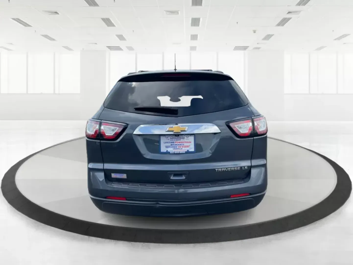 2014 Cyber Gray Metallic Chevrolet Traverse LS FWD w/PDC (1GNKRFED9EJ) with an 3.6L V6 DOHC 24V engine, 6-Speed Automatic transmission, located at 880 E. National Road, Vandalia, OH, 45377, (937) 908-9800, 39.891918, -84.183594 - 2014 Chevrolet Traverse LS FWD w/PDC - Photo#4