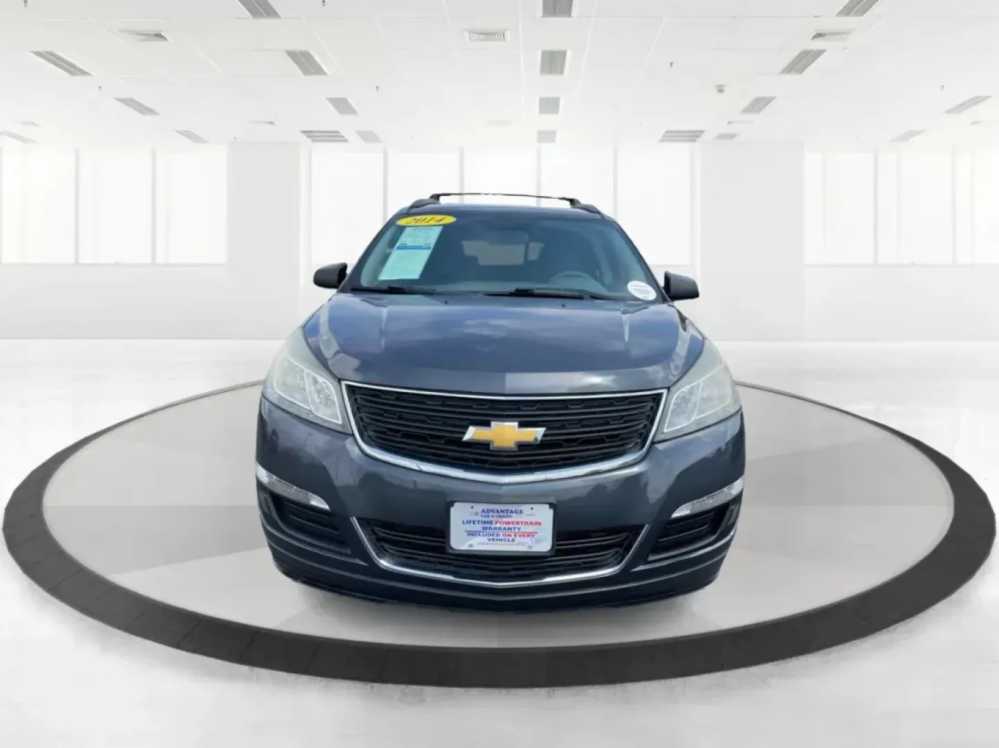 2014 Cyber Gray Metallic Chevrolet Traverse LS FWD w/PDC (1GNKRFED9EJ) with an 3.6L V6 DOHC 24V engine, 6-Speed Automatic transmission, located at 880 E. National Road, Vandalia, OH, 45377, (937) 908-9800, 39.891918, -84.183594 - 2014 Chevrolet Traverse LS FWD w/PDC - Photo#7