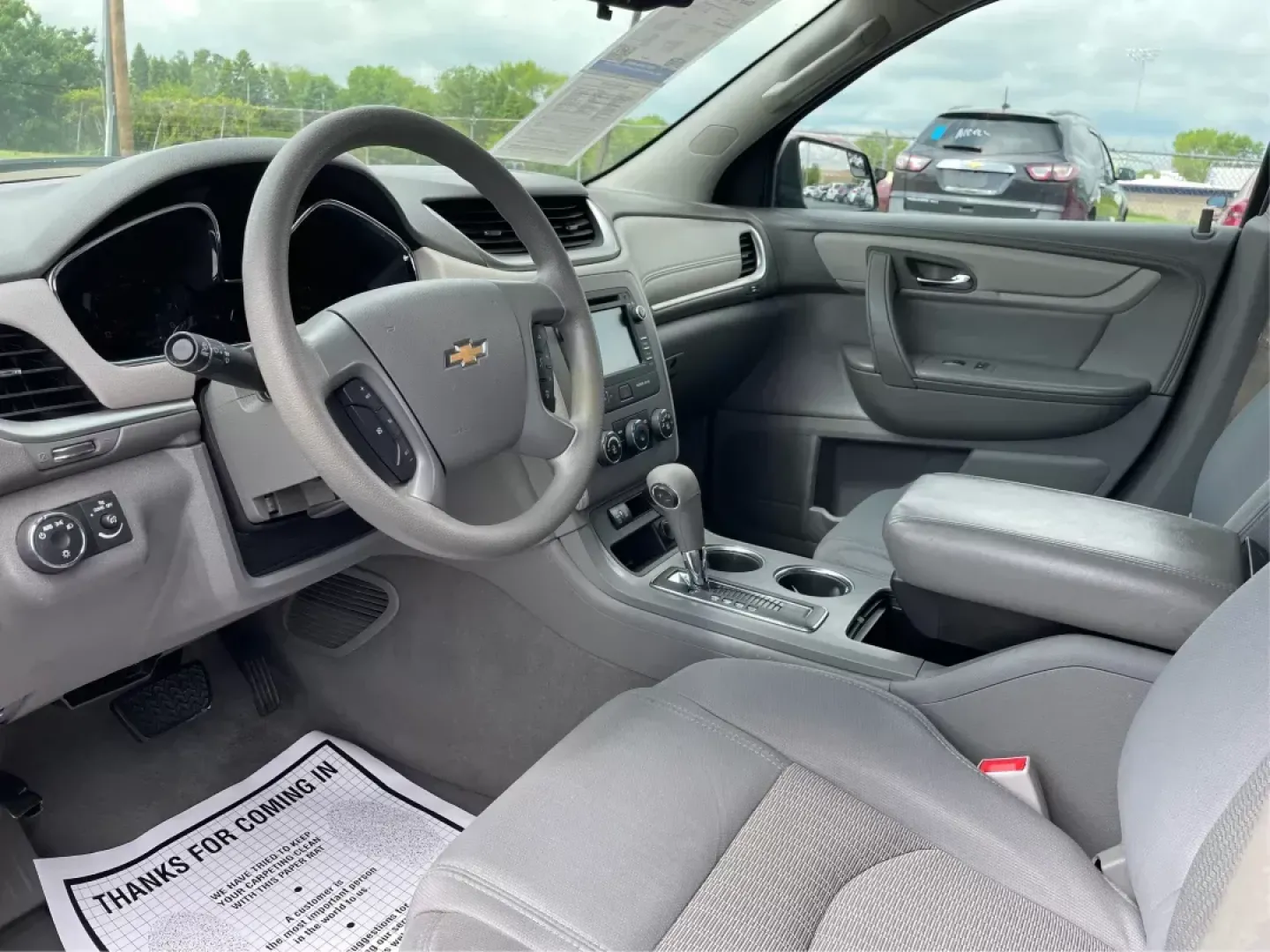 2014 Cyber Gray Metallic Chevrolet Traverse LS FWD w/PDC (1GNKRFED9EJ) with an 3.6L V6 DOHC 24V engine, 6-Speed Automatic transmission, located at 880 E. National Road, Vandalia, OH, 45377, (937) 908-9800, 39.891918, -84.183594 - 2014 Chevrolet Traverse LS FWD w/PDC - Photo#9