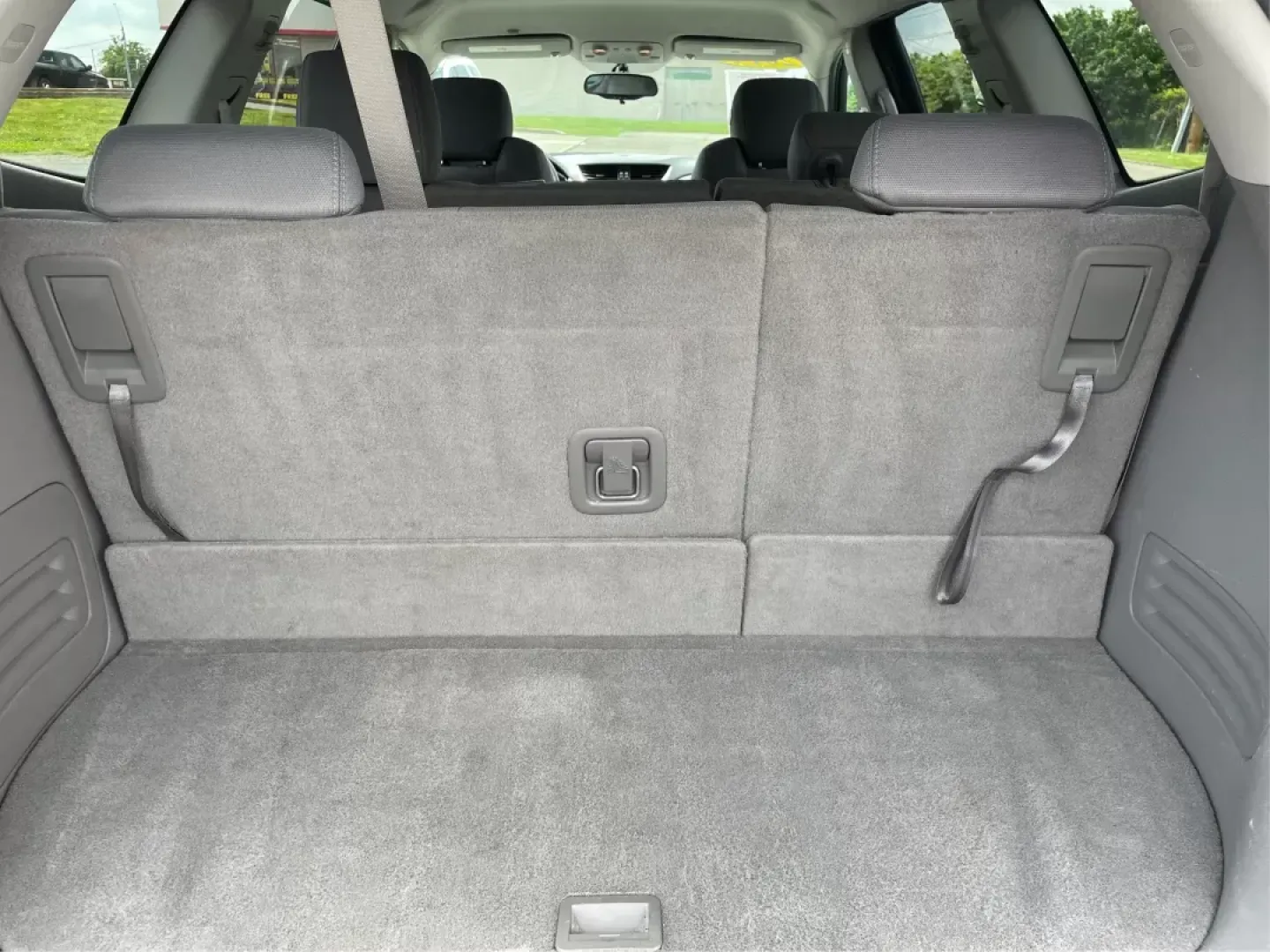 2014 Cyber Gray Metallic Chevrolet Traverse LS FWD w/PDC (1GNKRFED9EJ) with an 3.6L V6 DOHC 24V engine, 6-Speed Automatic transmission, located at 880 E. National Road, Vandalia, OH, 45377, (937) 908-9800, 39.891918, -84.183594 - 2014 Chevrolet Traverse LS FWD w/PDC - Photo#12