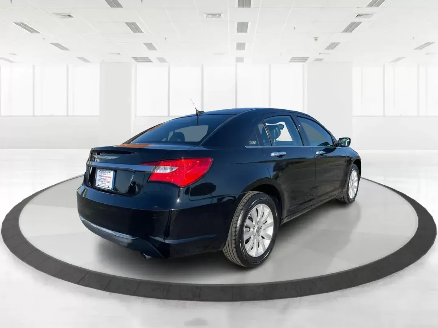 2014 Chrysler 200 Limited (1C3CCBCG6EN) with an 3.6L V6 DOHC 24V FFV engine, 6-Speed Automatic transmission, located at 1184 Kauffman Ave, Fairborn, OH, 45324, (937) 908-9800, 39.807072, -84.030914 - 2014 Chrysler 200 Limited - Photo#2
