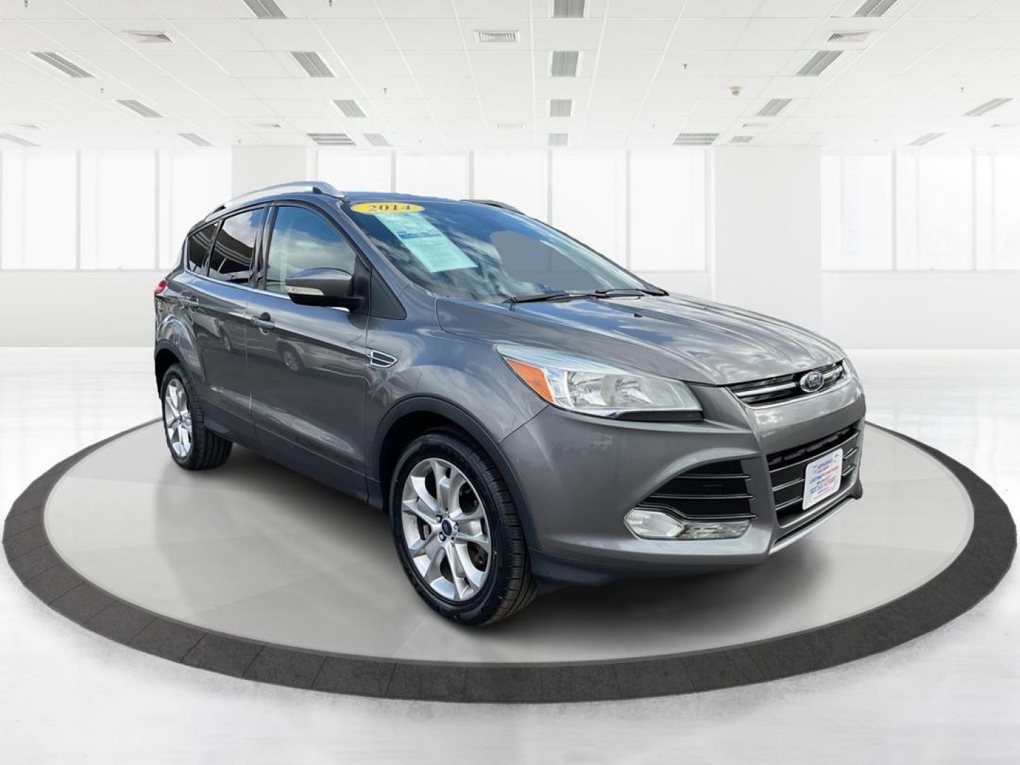 2014 Ford Escape Titanium (1FMCU9J95EU) with an EcoBoost 1.6L I-4 gasoline direct injection engine, located at 8750 N County Rd 25A, Piqua, OH, 45356, (937) 908-9800, 40.164391, -84.232513 - 2014 Ford Escape Titanium - Photo#0