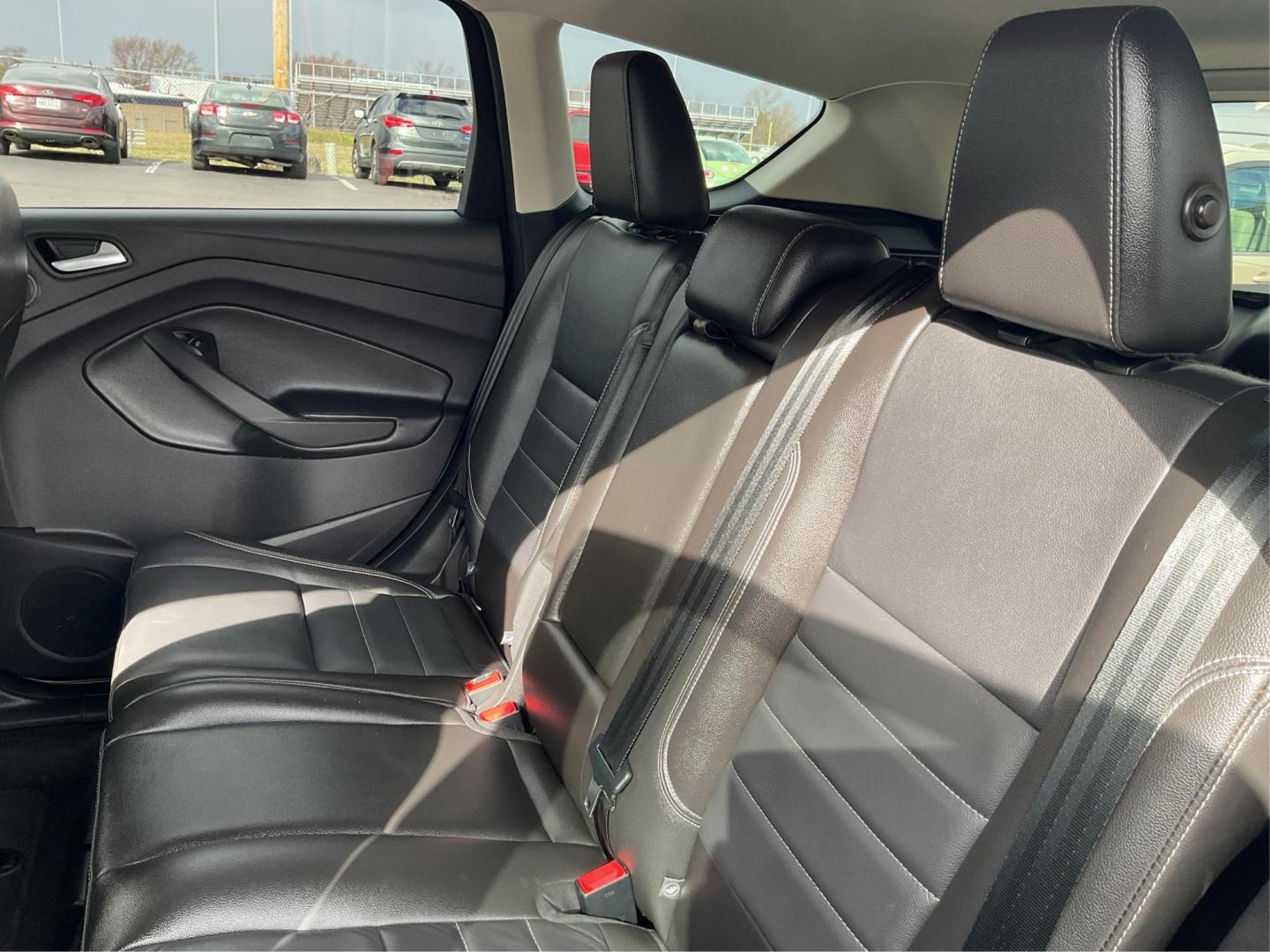 2014 Ford Escape Titanium (1FMCU9J95EU) with an EcoBoost 1.6L I-4 gasoline direct injection engine, located at 8750 N County Rd 25A, Piqua, OH, 45356, (937) 908-9800, 40.164391, -84.232513 - 2014 Ford Escape Titanium - Photo#9
