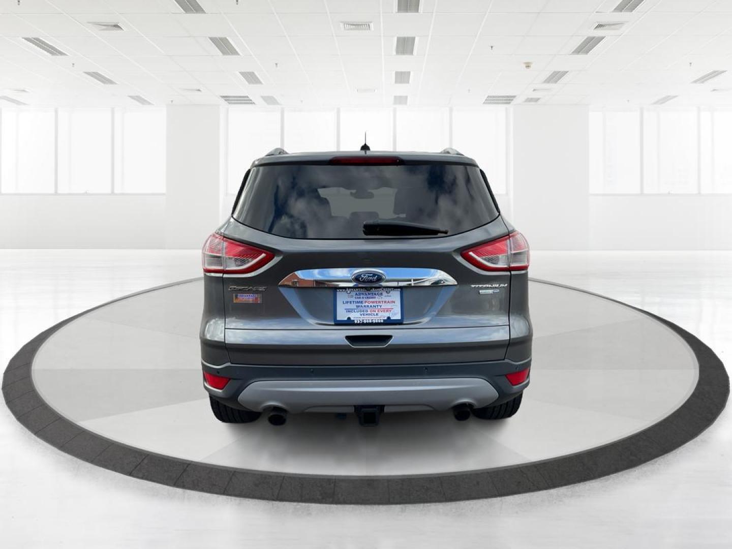 2014 Ford Escape Titanium (1FMCU9J95EU) with an EcoBoost 1.6L I-4 gasoline direct injection engine, located at 8750 N County Rd 25A, Piqua, OH, 45356, (937) 908-9800, 40.164391, -84.232513 - 2014 Ford Escape Titanium - Photo#3