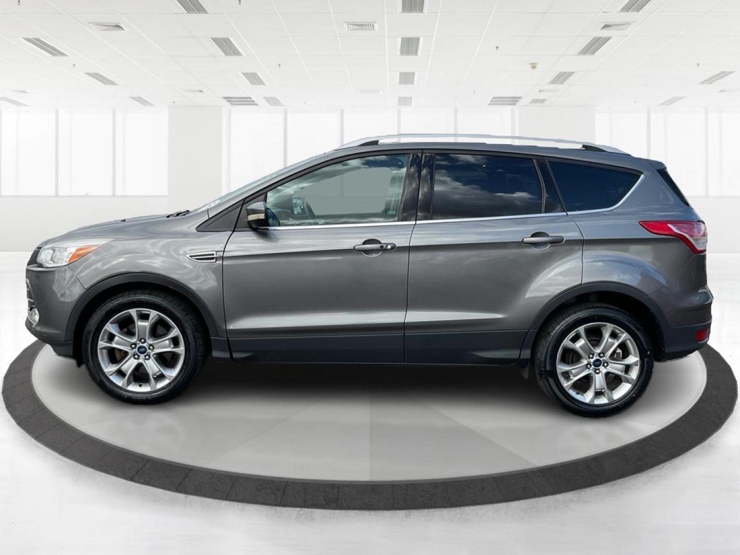 2014 Ford Escape Titanium (1FMCU9J95EU) with an EcoBoost 1.6L I-4 gasoline direct injection engine, located at 8750 N County Rd 25A, Piqua, OH, 45356, (937) 908-9800, 40.164391, -84.232513 - 2014 Ford Escape Titanium - Photo#5