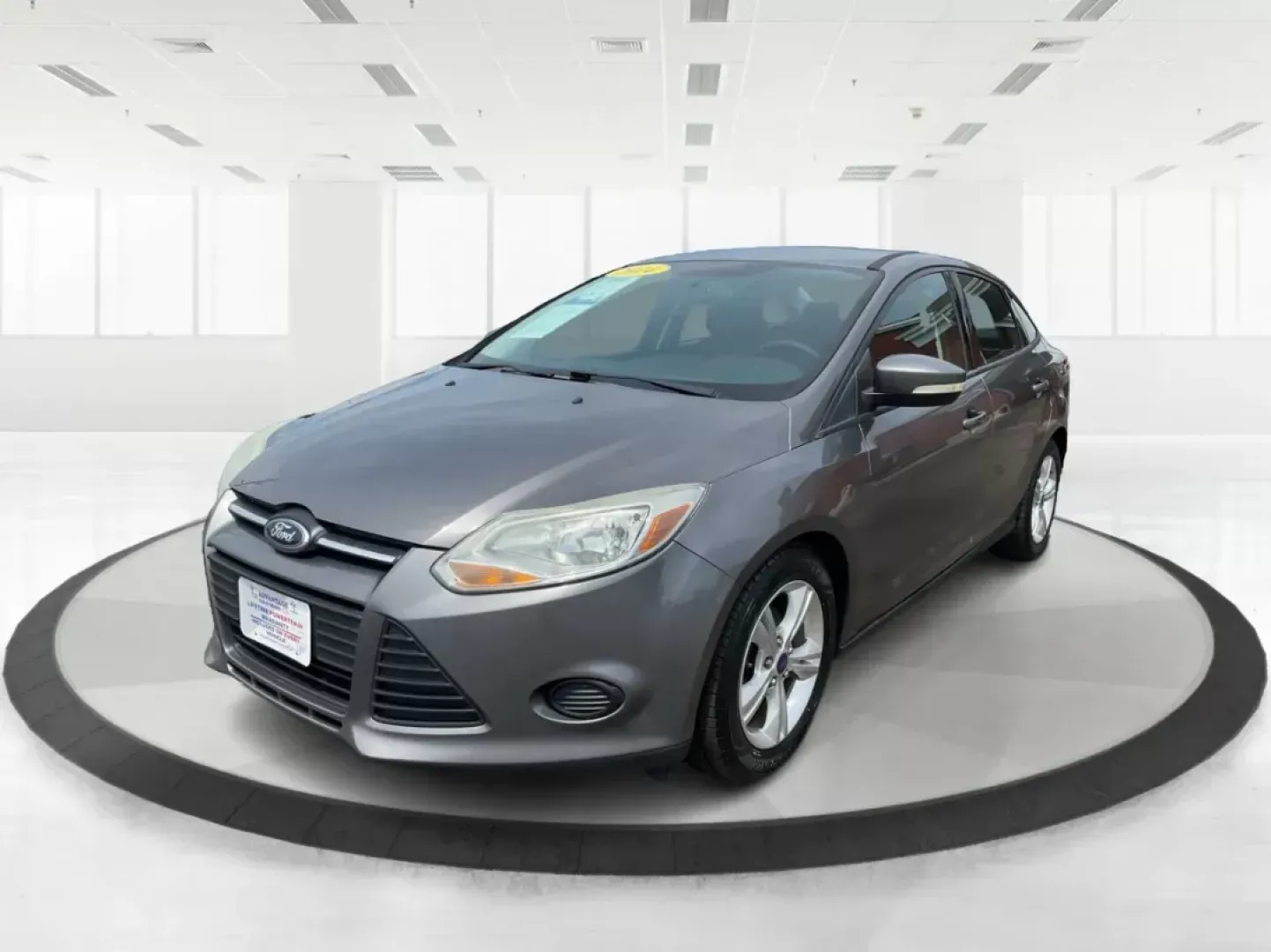 2014 Ford Focus SE (1FADP3F21EL) with an 2L I-4 gasoline direct injection engine, located at 1099 N County Rd 25A , Troy, OH, 45373, (937) 908-9800, 40.057079, -84.212883 - **Discover Your Next Adventure with the 2014 Ford Focus SE in Fairborn, OH!**<br /> <br /> Are you ready to elevate your daily commute or embark on weekend getaways? The 2014 Ford Focus SE is the perfect sedan to complement your lifestyle, offering a blend of efficiency, comfort, and cutting-edge fe - Photo#7