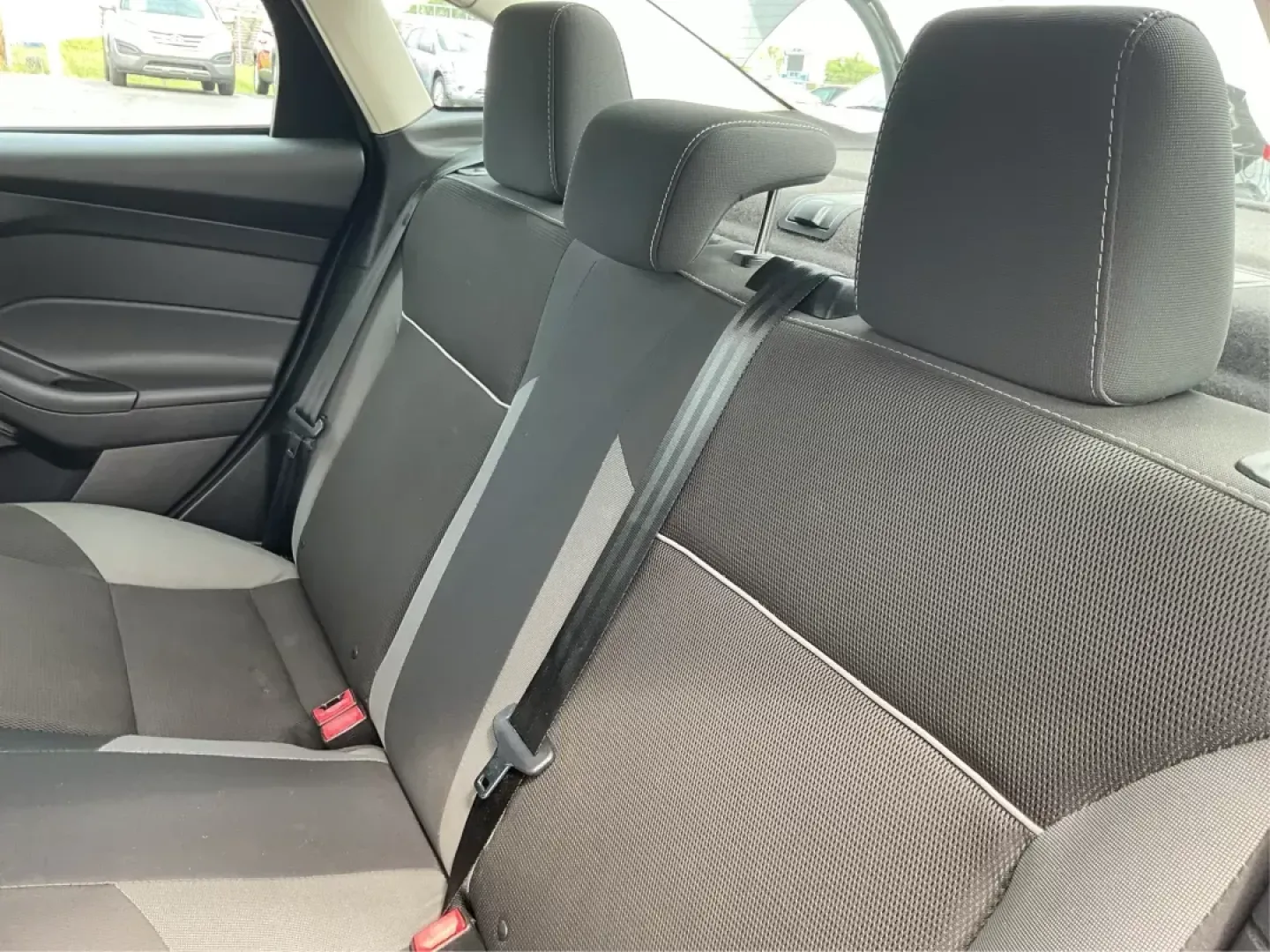 2014 Ford Focus SE (1FADP3F21EL) with an 2L I-4 gasoline direct injection engine, located at 1099 N County Rd 25A , Troy, OH, 45373, (937) 908-9800, 40.057079, -84.212883 - **Discover Your Next Adventure with the 2014 Ford Focus SE in Fairborn, OH!**<br /> <br /> Are you ready to elevate your daily commute or embark on weekend getaways? The 2014 Ford Focus SE is the perfect sedan to complement your lifestyle, offering a blend of efficiency, comfort, and cutting-edge fe - Photo#9