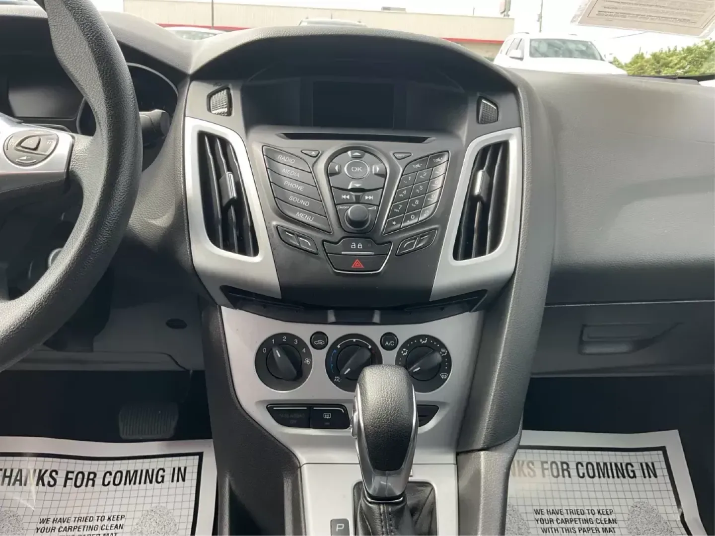 2014 Ford Focus SE (1FADP3F21EL) with an 2L I-4 gasoline direct injection engine, located at 1099 N County Rd 25A , Troy, OH, 45373, (937) 908-9800, 40.057079, -84.212883 - **Discover Your Next Adventure with the 2014 Ford Focus SE in Fairborn, OH!**<br /> <br /> Are you ready to elevate your daily commute or embark on weekend getaways? The 2014 Ford Focus SE is the perfect sedan to complement your lifestyle, offering a blend of efficiency, comfort, and cutting-edge fe - Photo#12