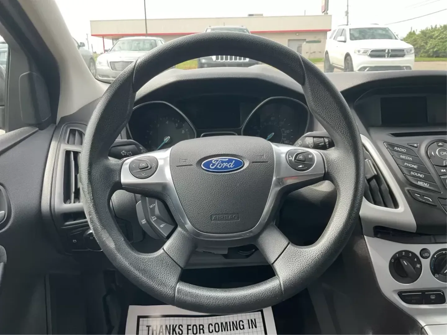 2014 Ford Focus SE (1FADP3F21EL) with an 2L I-4 gasoline direct injection engine, located at 1099 N County Rd 25A , Troy, OH, 45373, (937) 908-9800, 40.057079, -84.212883 - **Discover Your Next Adventure with the 2014 Ford Focus SE in Fairborn, OH!**<br /> <br /> Are you ready to elevate your daily commute or embark on weekend getaways? The 2014 Ford Focus SE is the perfect sedan to complement your lifestyle, offering a blend of efficiency, comfort, and cutting-edge fe - Photo#15