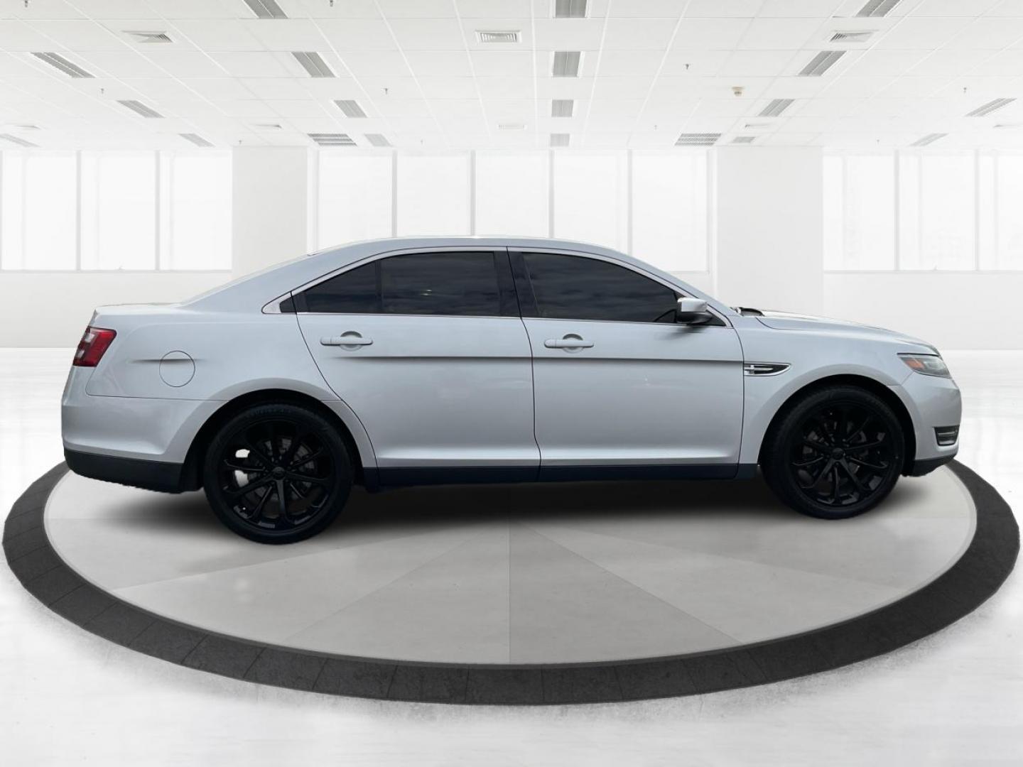 2014 Ford Taurus SEL (1FAHP2E86EG) with an EcoBoost 2L I-4 gasoline direct injection engine, located at 1099 N County Rd 25A , Troy, OH, 45373, (937) 908-9800, 40.057079, -84.212883 - 2014 Ford Taurus SEL - Photo#1