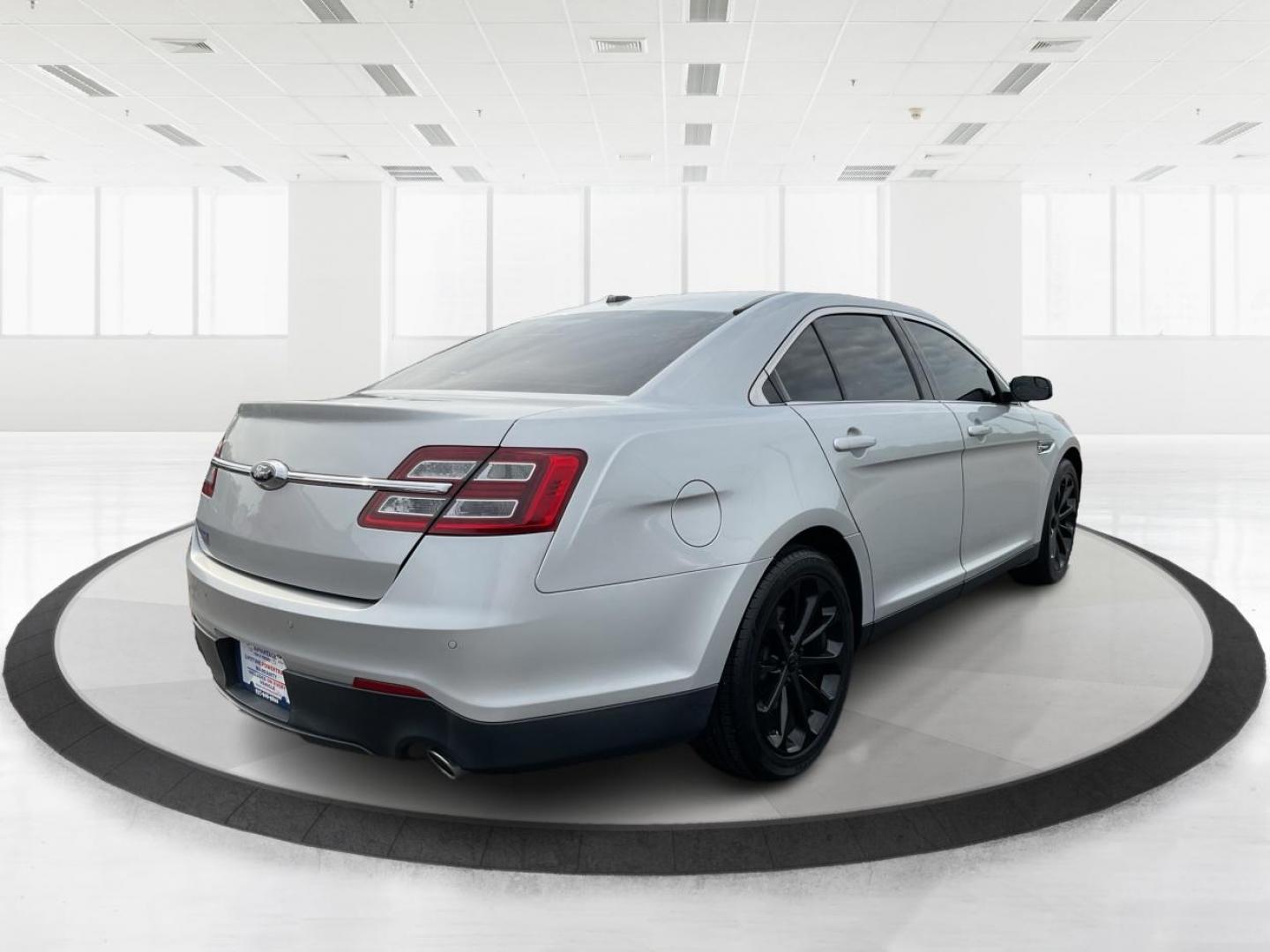 2014 Ford Taurus SEL (1FAHP2E86EG) with an EcoBoost 2L I-4 gasoline direct injection engine, located at 1099 N County Rd 25A , Troy, OH, 45373, (937) 908-9800, 40.057079, -84.212883 - 2014 Ford Taurus SEL - Photo#2