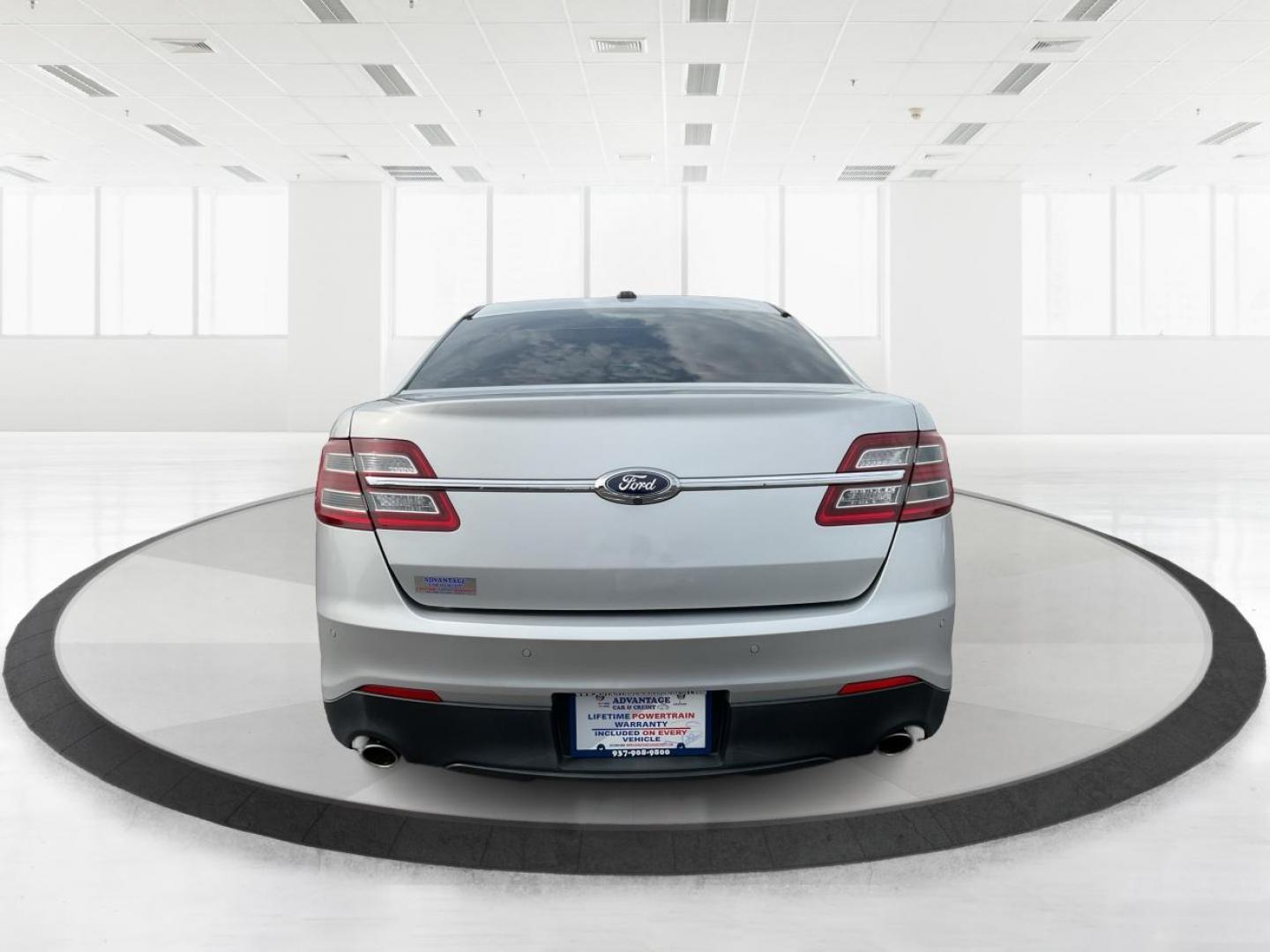 2014 Ford Taurus SEL (1FAHP2E86EG) with an EcoBoost 2L I-4 gasoline direct injection engine, located at 1099 N County Rd 25A , Troy, OH, 45373, (937) 908-9800, 40.057079, -84.212883 - 2014 Ford Taurus SEL - Photo#4