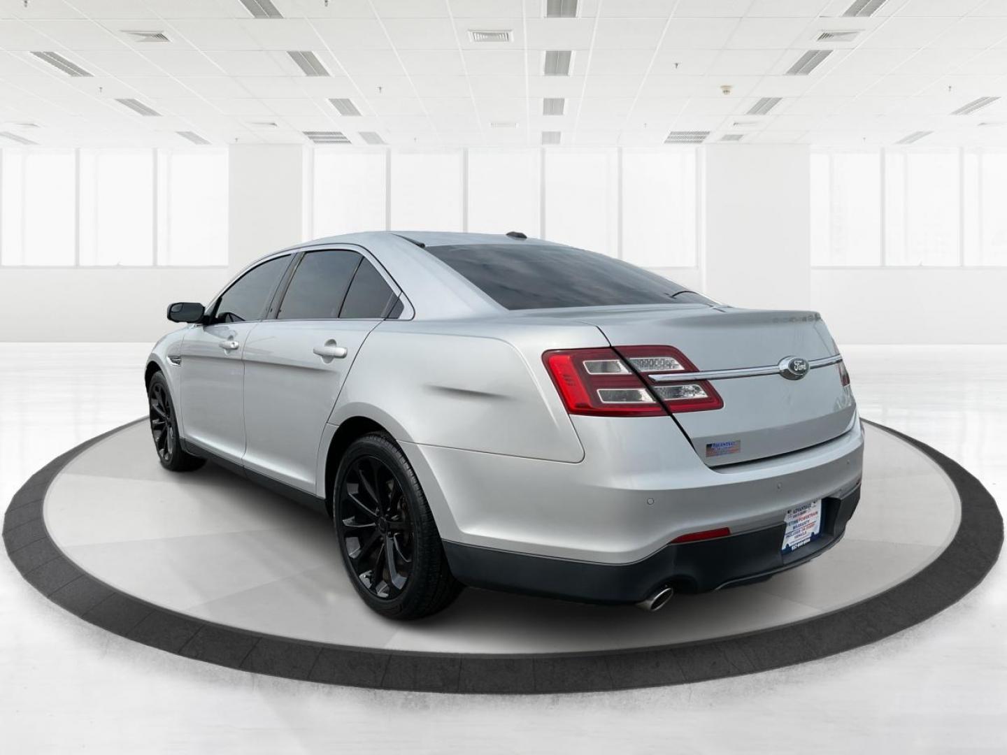 2014 Ford Taurus SEL (1FAHP2E86EG) with an EcoBoost 2L I-4 gasoline direct injection engine, located at 1099 N County Rd 25A , Troy, OH, 45373, (937) 908-9800, 40.057079, -84.212883 - 2014 Ford Taurus SEL - Photo#5