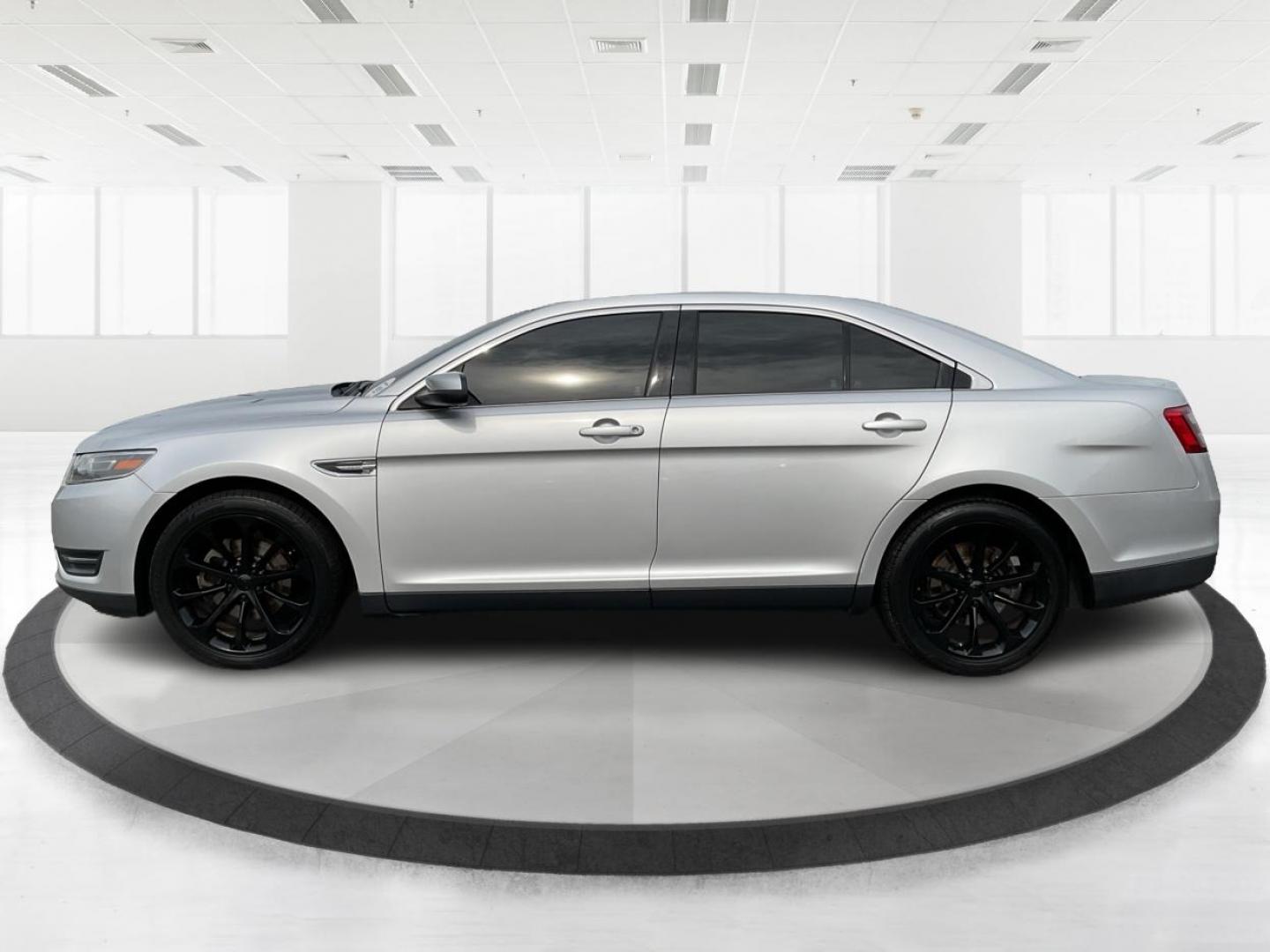 2014 Ford Taurus SEL (1FAHP2E86EG) with an EcoBoost 2L I-4 gasoline direct injection engine, located at 1099 N County Rd 25A , Troy, OH, 45373, (937) 908-9800, 40.057079, -84.212883 - 2014 Ford Taurus SEL - Photo#6