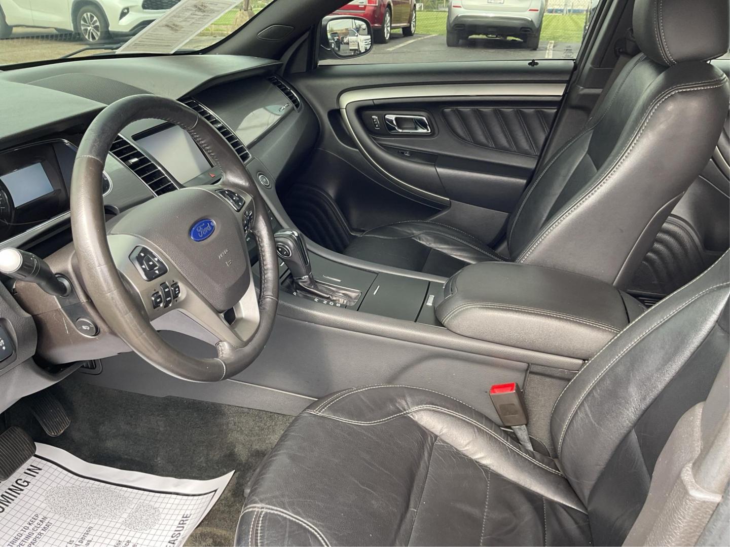 2014 Ford Taurus SEL (1FAHP2E86EG) with an EcoBoost 2L I-4 gasoline direct injection engine, located at 1099 N County Rd 25A , Troy, OH, 45373, (937) 908-9800, 40.057079, -84.212883 - 2014 Ford Taurus SEL - Photo#9