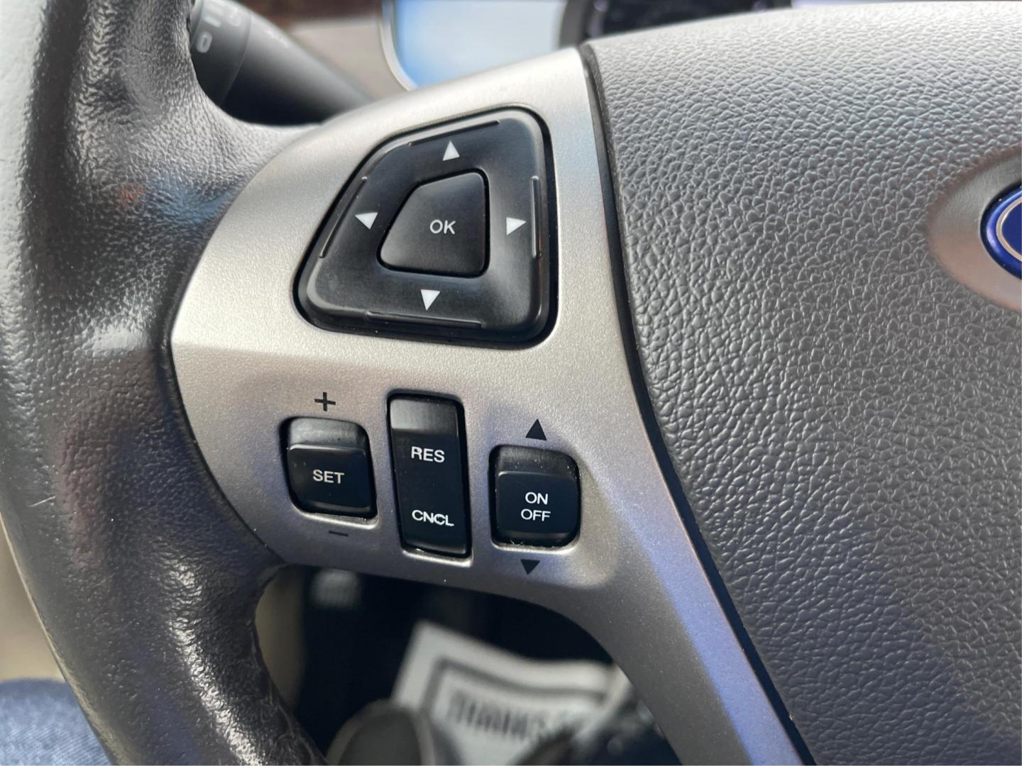 2014 Deep Impact Blue Metallic Ford Taurus Limited AWD (1FAHP2J86EG) with an 3.5L V6 DOHC 24V engine, 6-Speed Automatic transmission, located at 1184 Kauffman Ave, Fairborn, OH, 45324, (937) 908-9800, 39.807072, -84.030914 - 2014 Ford Taurus Limited AWD - Photo#13