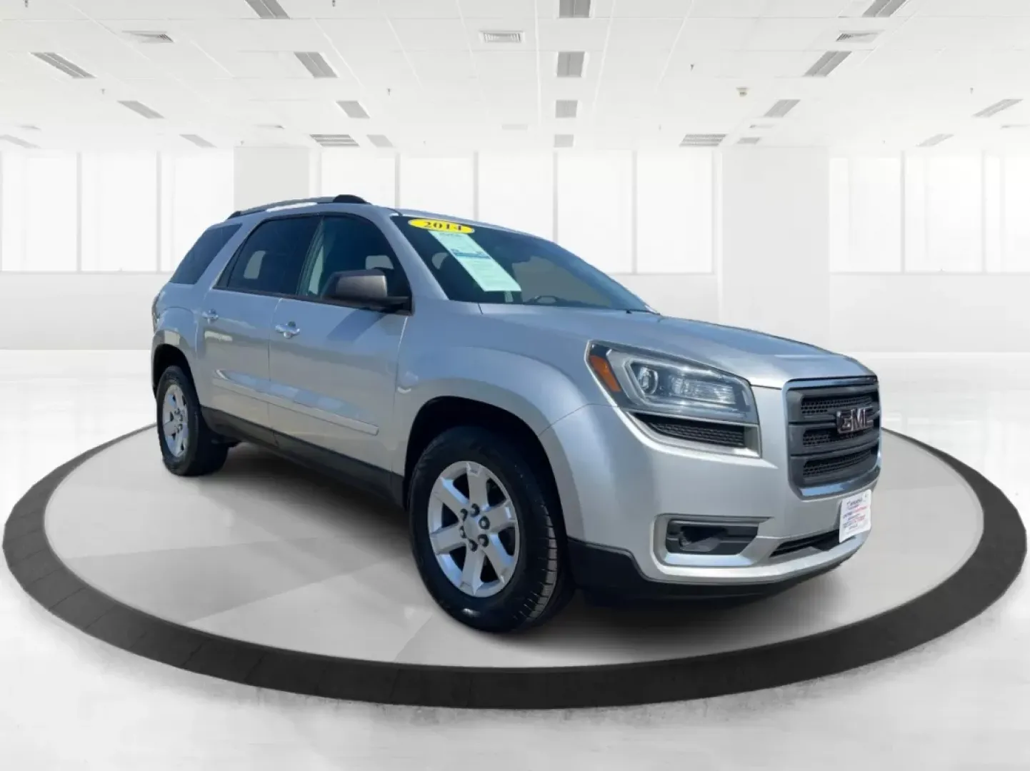 2014 GMC Acadia SLE-2 AWD (1GKKVPKD1EJ) with an 3.6L V6 DOHC 24V engine, 6-Speed Automatic transmission, located at 1099 N County Rd 25A , Troy, OH, 45373, (937) 908-9800, 40.057079, -84.212883 - If you're searching for the perfect family SUV that balances style, comfort, and an adventurous spirit, look no further than this stunning 2014 GMC Acadia SLE-2 AWD, now available at Advantage Car and Credit in Fairborn, OH. With spacious seating for up to eight passengers and the versatility needed - Photo#0