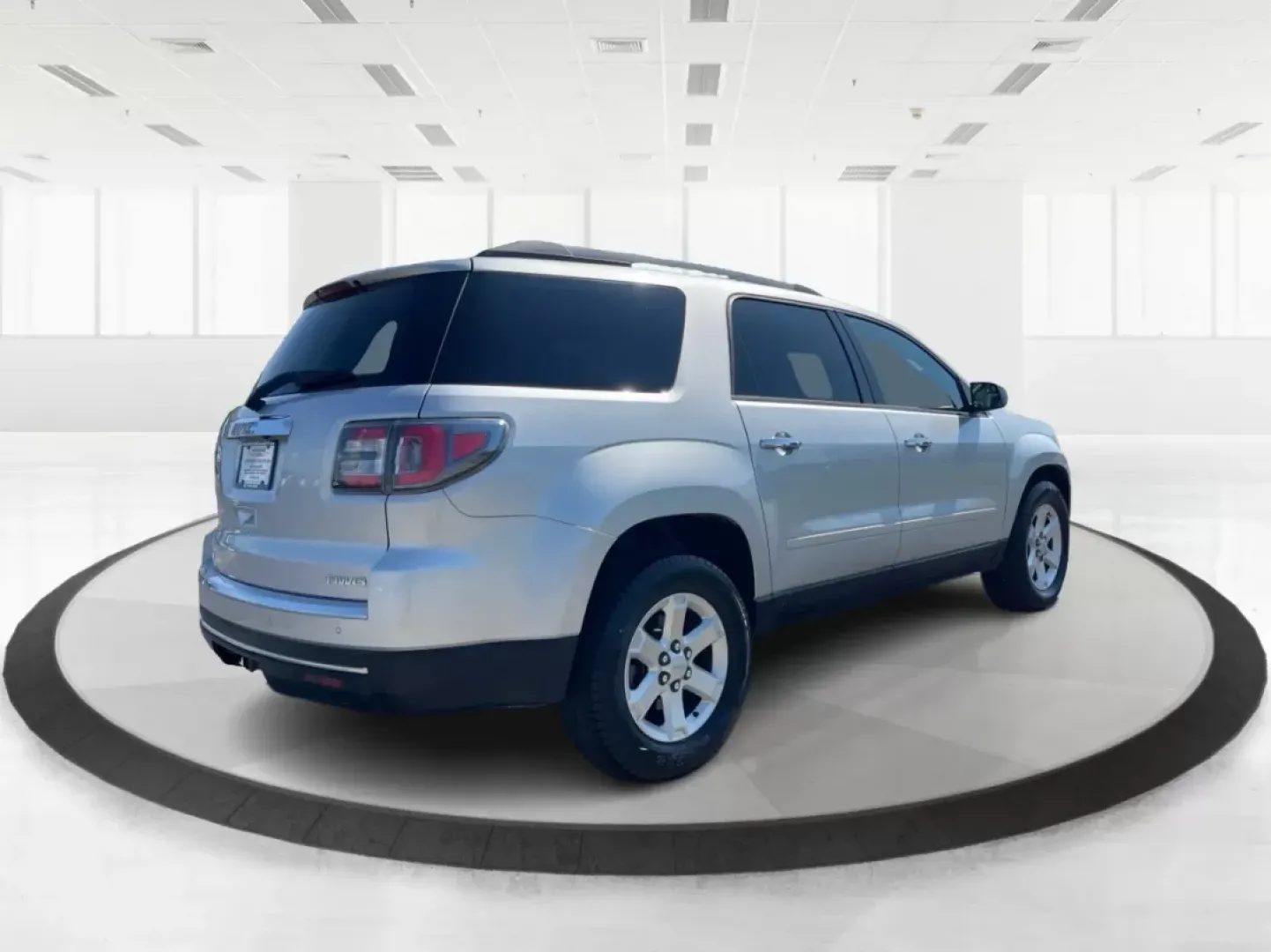 2014 GMC Acadia SLE-2 AWD (1GKKVPKD1EJ) with an 3.6L V6 DOHC 24V engine, 6-Speed Automatic transmission, located at 1099 N County Rd 25A , Troy, OH, 45373, (937) 908-9800, 40.057079, -84.212883 - If you're searching for the perfect family SUV that balances style, comfort, and an adventurous spirit, look no further than this stunning 2014 GMC Acadia SLE-2 AWD, now available at Advantage Car and Credit in Fairborn, OH. With spacious seating for up to eight passengers and the versatility needed - Photo#2