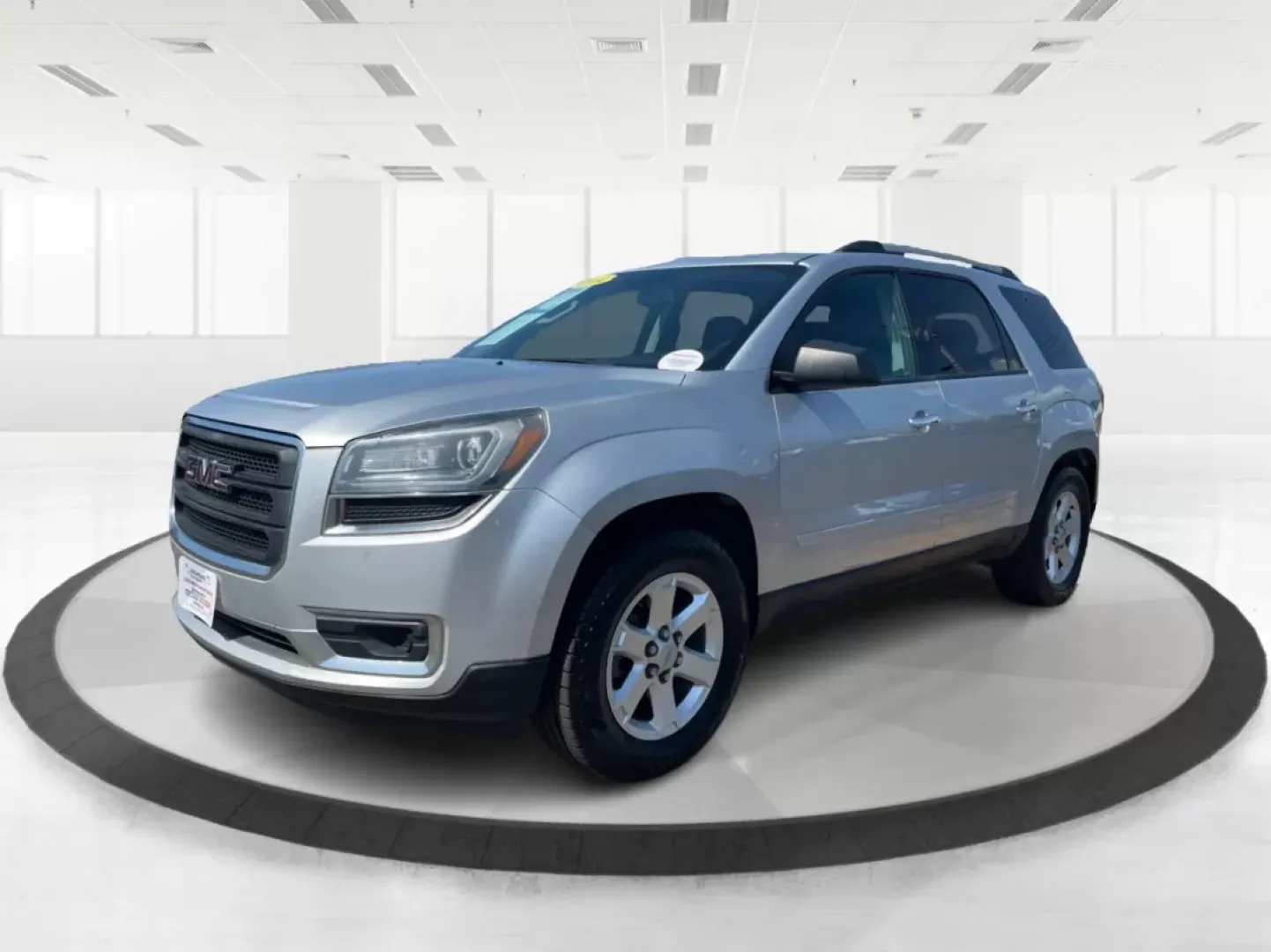 2014 GMC Acadia SLE-2 AWD (1GKKVPKD1EJ) with an 3.6L V6 DOHC 24V engine, 6-Speed Automatic transmission, located at 1099 N County Rd 25A , Troy, OH, 45373, (937) 908-9800, 40.057079, -84.212883 - If you're searching for the perfect family SUV that balances style, comfort, and an adventurous spirit, look no further than this stunning 2014 GMC Acadia SLE-2 AWD, now available at Advantage Car and Credit in Fairborn, OH. With spacious seating for up to eight passengers and the versatility needed - Photo#7
