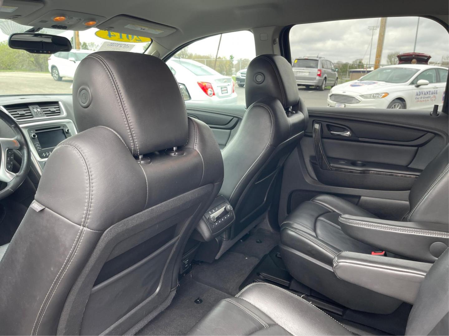 2014 GMC Acadia SLT-1 (1GKKVRKD2EJ) with an 3.6L V-6 gasoline direct injection engine, located at 1099 N County Rd 25A , Troy, OH, 45373, (937) 908-9800, 40.057079, -84.212883 - Third Row - Photo#9