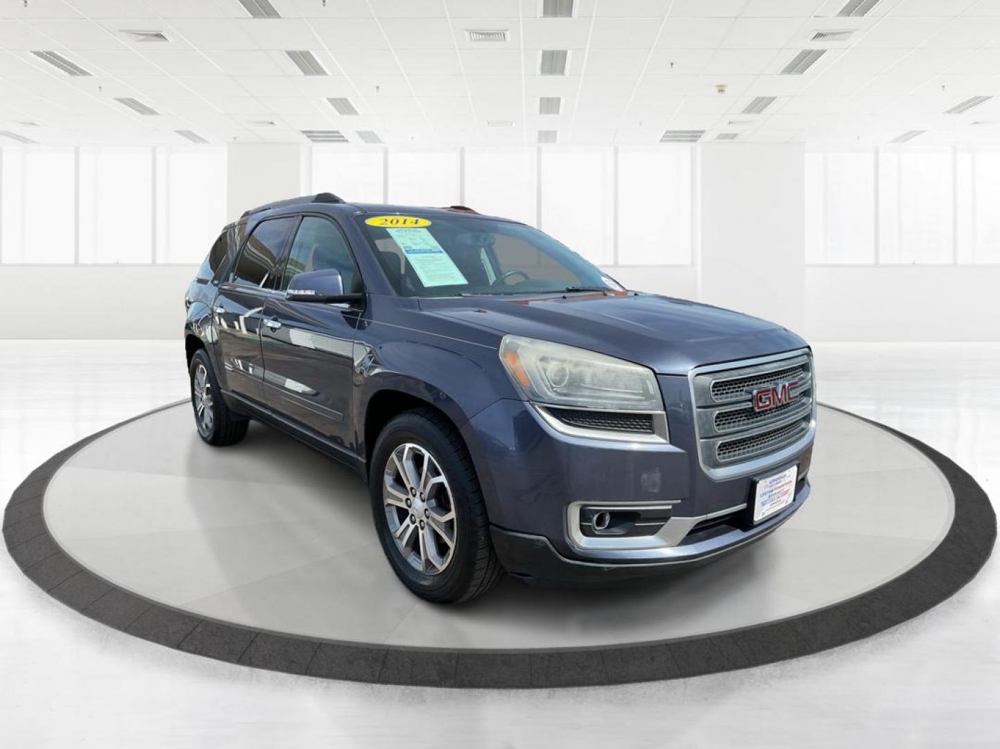 2014 GMC Acadia SLT-1 (1GKKVRKD7EJ) with an 3.6L V-6 gasoline direct injection engine, located at 880 E. National Road, Vandalia, OH, 45377, (937) 908-9800, 39.891918, -84.183594 - Third Row - Photo#0