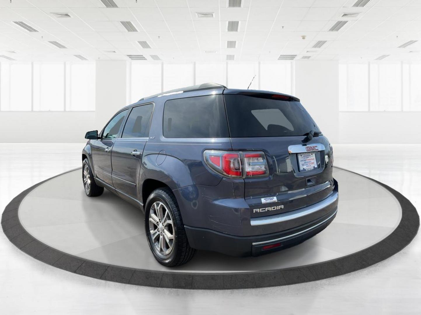 2014 GMC Acadia SLT-1 (1GKKVRKD7EJ) with an 3.6L V-6 gasoline direct injection engine, located at 880 E. National Road, Vandalia, OH, 45377, (937) 908-9800, 39.891918, -84.183594 - Third Row - Photo#4
