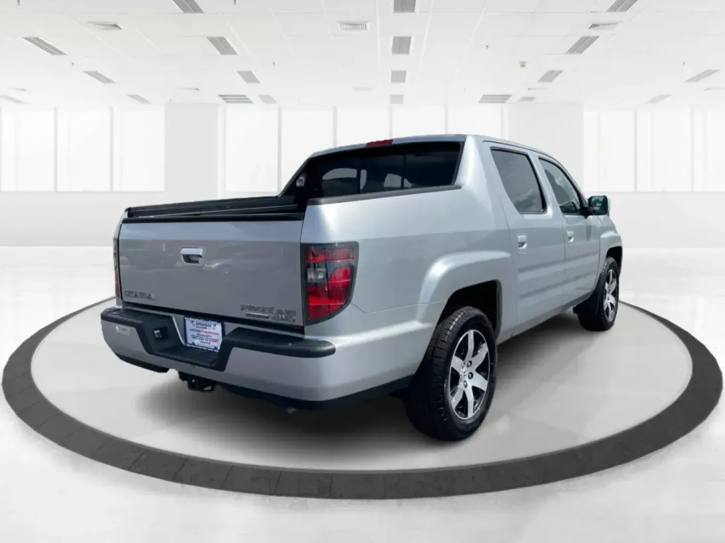 2014 Honda Ridgeline RTL-S (5FPYK1F67EB) with an 3.5L V6 SOHC 24V engine, 5-Speed Automatic transmission, located at 1230 East Main St, Xenia, OH, 45385, (937) 908-9800, 39.688026, -83.910172 - One Owner - Photo#1