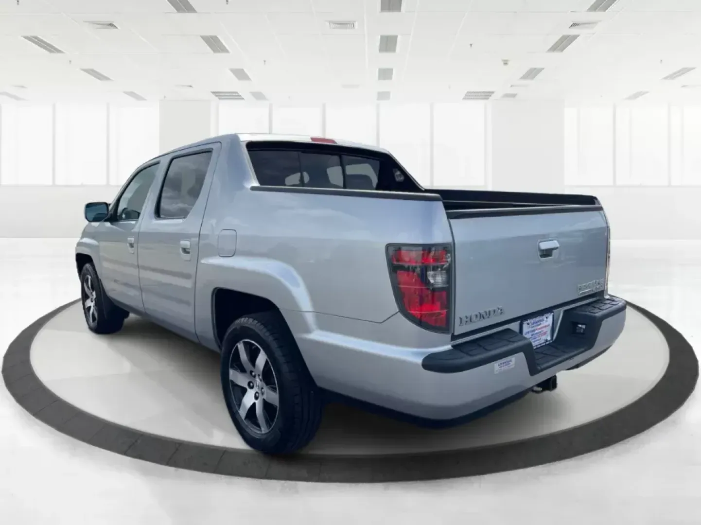 2014 Honda Ridgeline RTL-S (5FPYK1F67EB) with an 3.5L V6 SOHC 24V engine, 5-Speed Automatic transmission, located at 1230 East Main St, Xenia, OH, 45385, (937) 908-9800, 39.688026, -83.910172 - One Owner - Photo#4