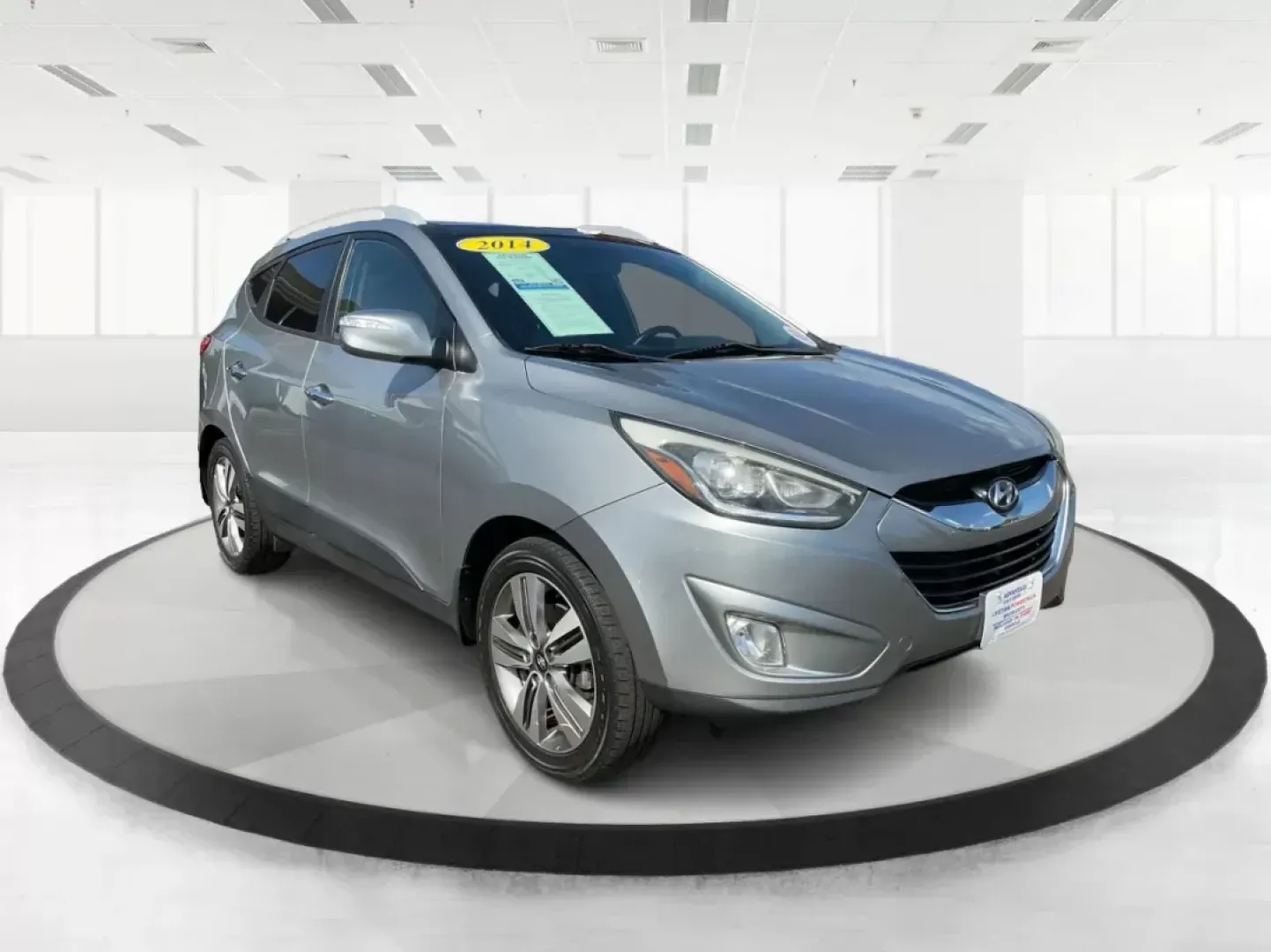 2014 Hyundai Tucson Limited (KM8JUCAG9EU) with an Theta II 2.4L I-4 gasoline direct injection engine, located at 8750 N County Rd 25A, Piqua, OH, 45356, (937) 908-9800, 40.164391, -84.232513 - 2014 Hyundai Tucson Limited - Photo#0