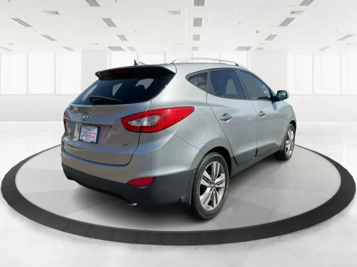 2014 Hyundai Tucson Limited (KM8JUCAG9EU) with an Theta II 2.4L I-4 gasoline direct injection engine, located at 8750 N County Rd 25A, Piqua, OH, 45356, (937) 908-9800, 40.164391, -84.232513 - 2014 Hyundai Tucson Limited - Photo#1
