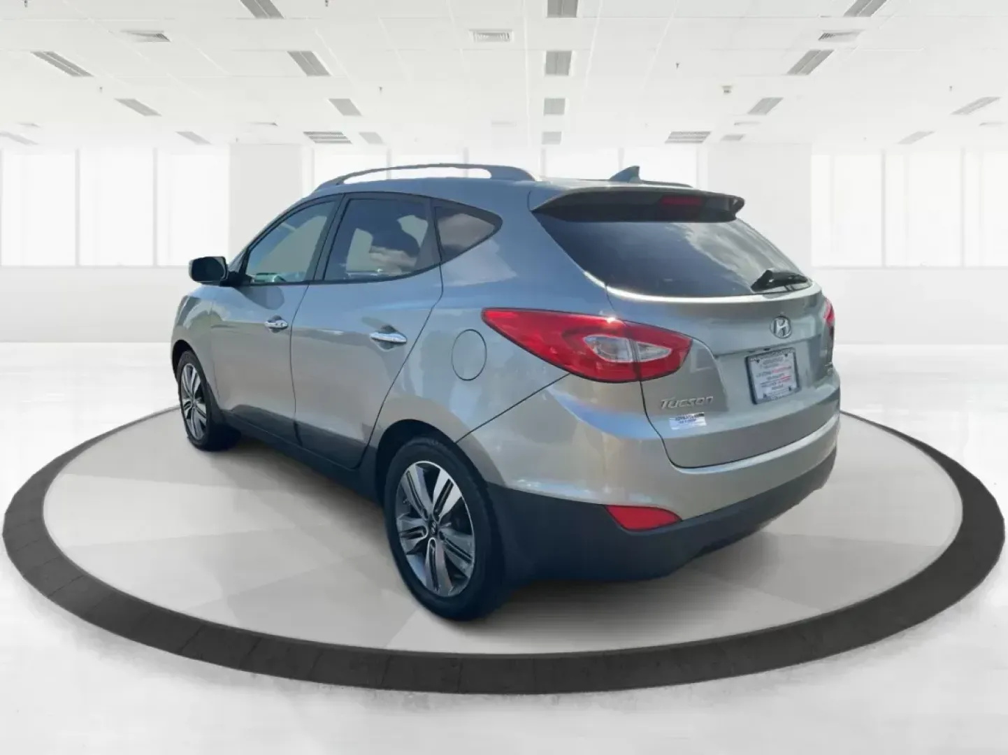 2014 Hyundai Tucson Limited (KM8JUCAG9EU) with an Theta II 2.4L I-4 gasoline direct injection engine, located at 8750 N County Rd 25A, Piqua, OH, 45356, (937) 908-9800, 40.164391, -84.232513 - 2014 Hyundai Tucson Limited - Photo#4