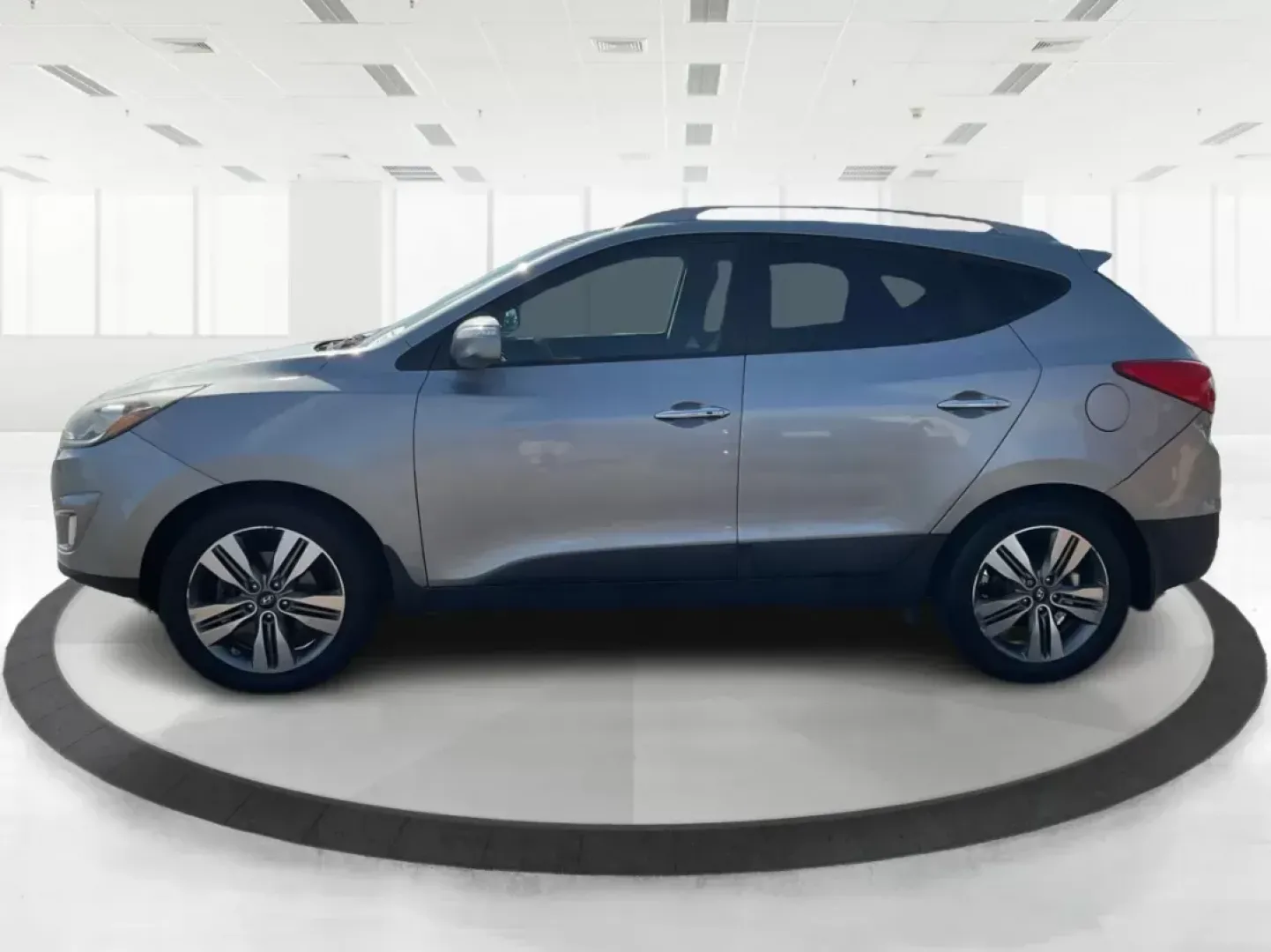 2014 Hyundai Tucson Limited (KM8JUCAG9EU) with an Theta II 2.4L I-4 gasoline direct injection engine, located at 8750 N County Rd 25A, Piqua, OH, 45356, (937) 908-9800, 40.164391, -84.232513 - 2014 Hyundai Tucson Limited - Photo#5