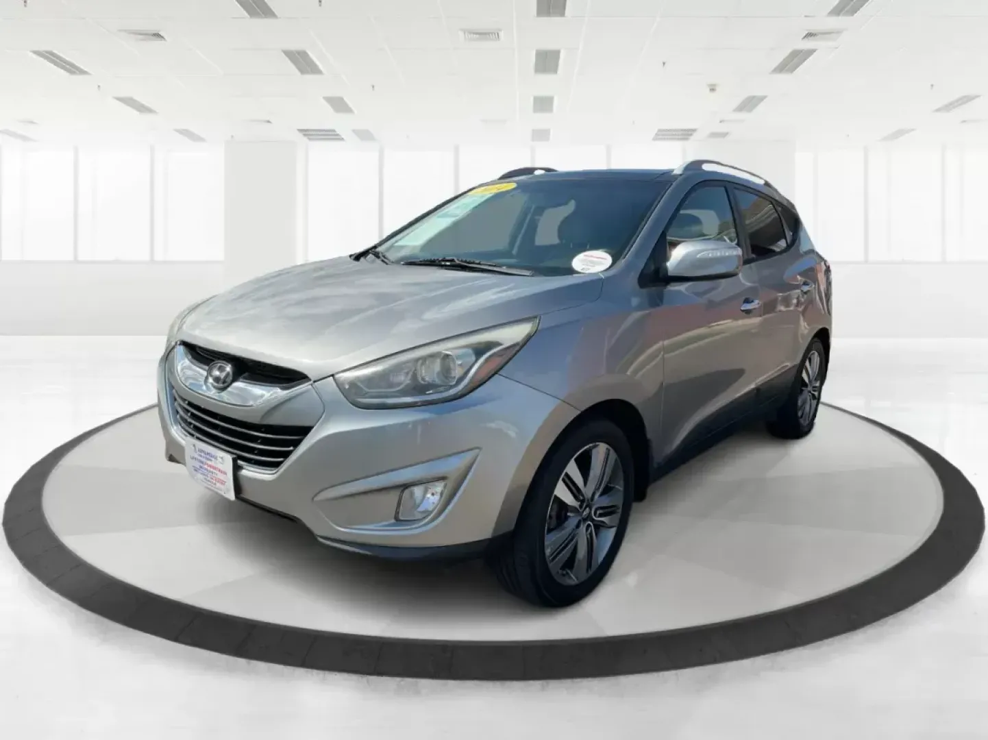 2014 Hyundai Tucson Limited (KM8JUCAG9EU) with an Theta II 2.4L I-4 gasoline direct injection engine, located at 8750 N County Rd 25A, Piqua, OH, 45356, (937) 908-9800, 40.164391, -84.232513 - 2014 Hyundai Tucson Limited - Photo#7