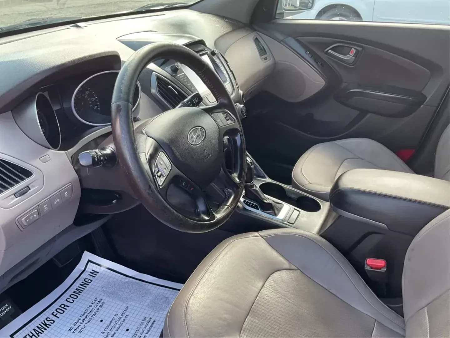 2014 Hyundai Tucson Limited (KM8JUCAG9EU) with an Theta II 2.4L I-4 gasoline direct injection engine, located at 8750 N County Rd 25A, Piqua, OH, 45356, (937) 908-9800, 40.164391, -84.232513 - 2014 Hyundai Tucson Limited - Photo#8