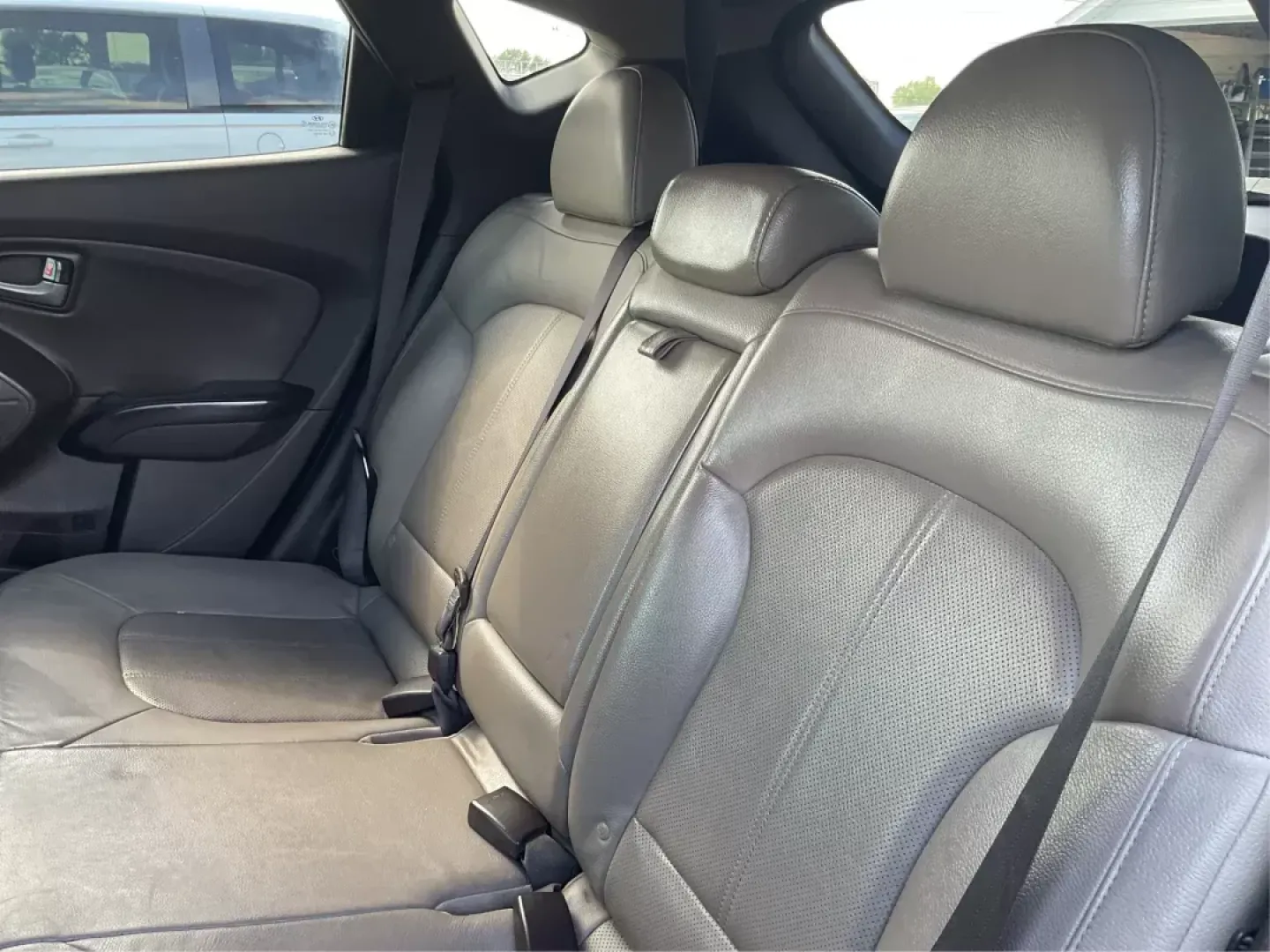 2014 Hyundai Tucson Limited (KM8JUCAG9EU) with an Theta II 2.4L I-4 gasoline direct injection engine, located at 8750 N County Rd 25A, Piqua, OH, 45356, (937) 908-9800, 40.164391, -84.232513 - 2014 Hyundai Tucson Limited - Photo#9