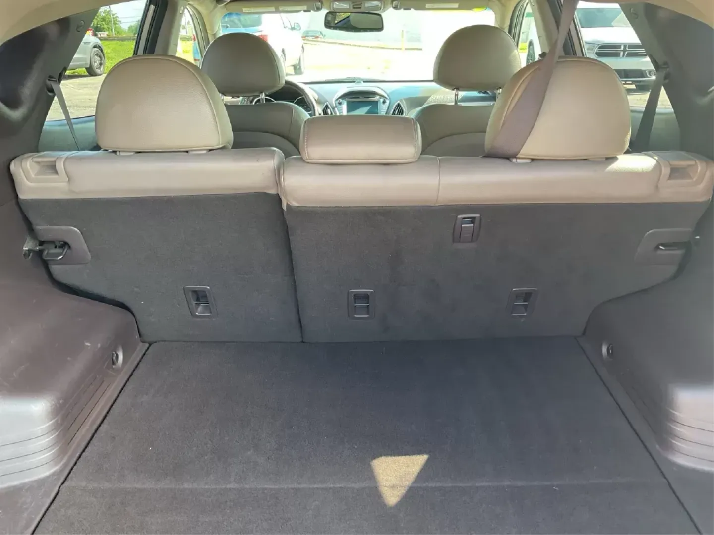 2014 Hyundai Tucson Limited (KM8JUCAG9EU) with an Theta II 2.4L I-4 gasoline direct injection engine, located at 8750 N County Rd 25A, Piqua, OH, 45356, (937) 908-9800, 40.164391, -84.232513 - 2014 Hyundai Tucson Limited - Photo#11