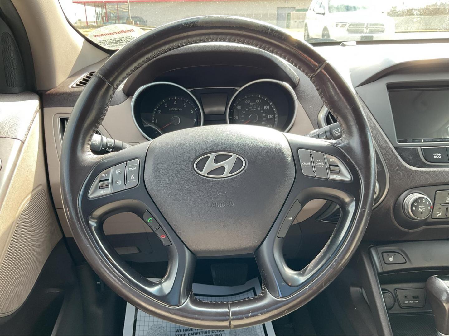 2014 Hyundai Tucson SE (KM8JU3AG0EU) with an Theta II 2.4L I-4 gasoline direct injection engine, located at 1230 East Main St, Xenia, OH, 45385, (937) 908-9800, 39.688026, -83.910172 - 2014 Hyundai Tucson SE - Photo#13