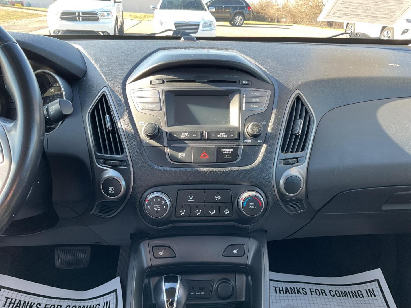 2014 Hyundai Tucson SE (KM8JUCAG8EU) with an Theta II 2.4L I-4 gasoline direct injection engine, located at 1230 East Main St, Xenia, OH, 45385, (937) 908-9800, 39.688026, -83.910172 - 2014 Hyundai Tucson SE - Photo#12