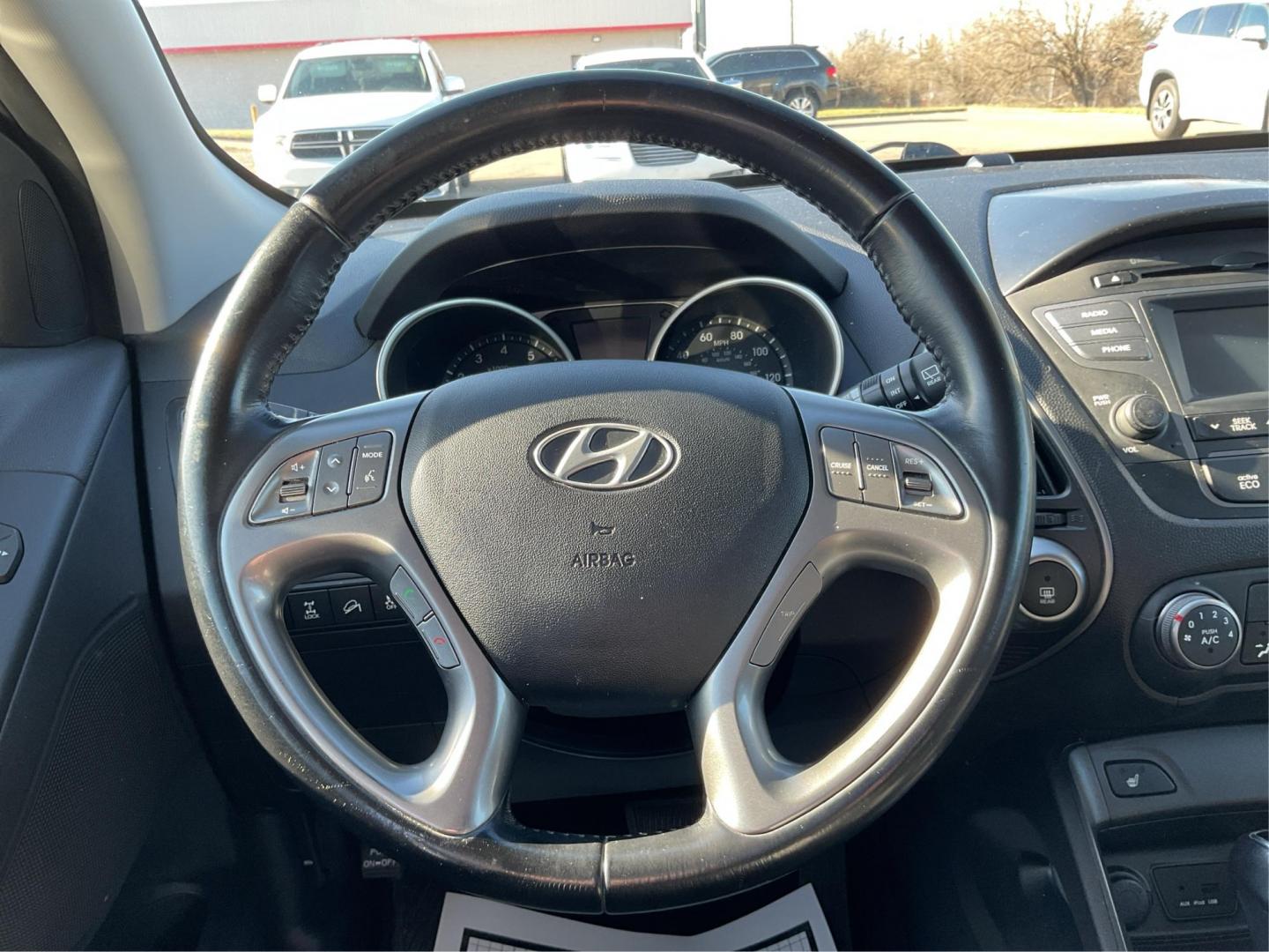 2014 Hyundai Tucson SE (KM8JUCAG8EU) with an Theta II 2.4L I-4 gasoline direct injection engine, located at 1230 East Main St, Xenia, OH, 45385, (937) 908-9800, 39.688026, -83.910172 - 2014 Hyundai Tucson SE - Photo#15