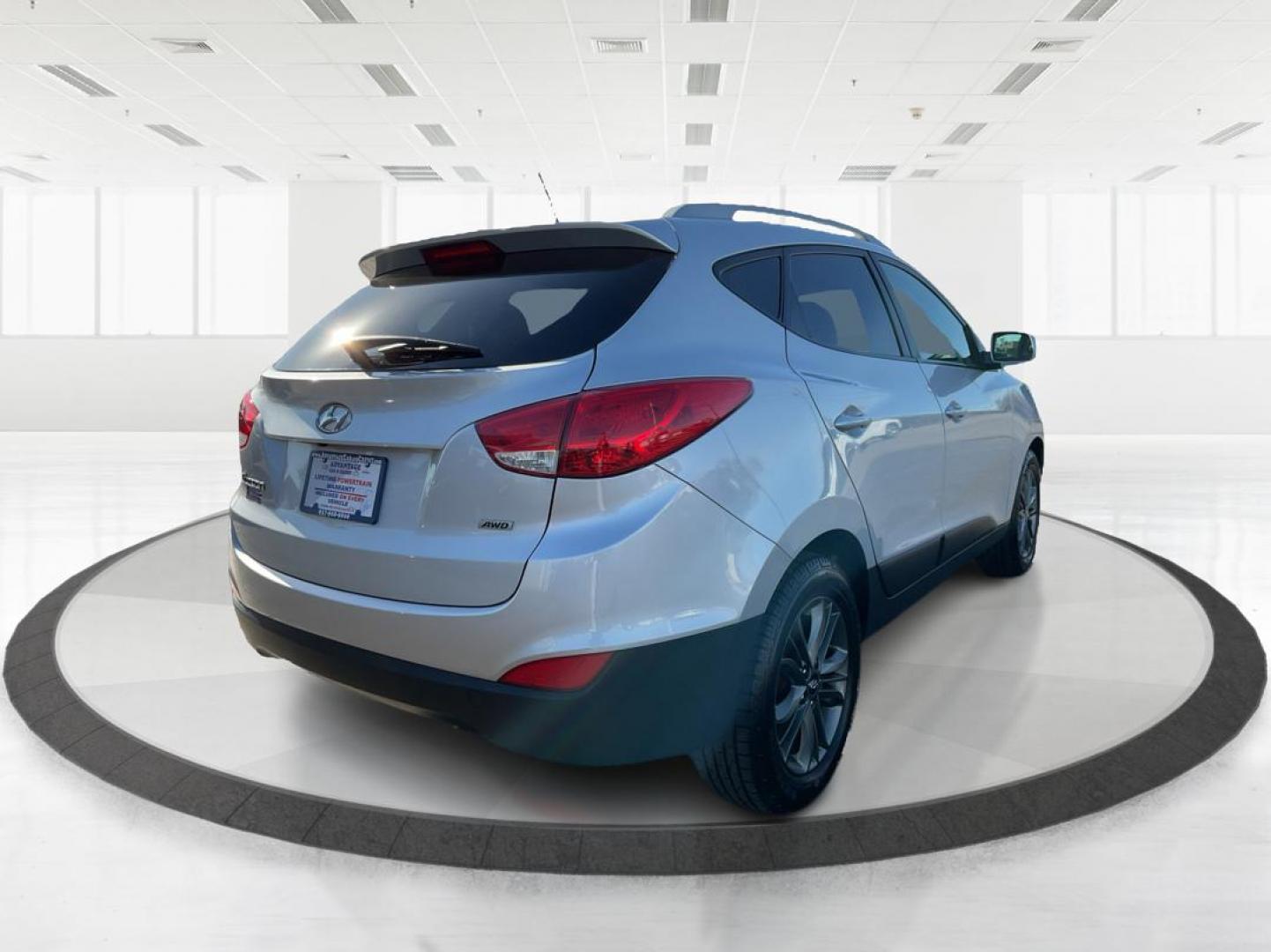 2014 Hyundai Tucson SE (KM8JUCAG8EU) with an Theta II 2.4L I-4 gasoline direct injection engine, located at 1230 East Main St, Xenia, OH, 45385, (937) 908-9800, 39.688026, -83.910172 - 2014 Hyundai Tucson SE - Photo#2