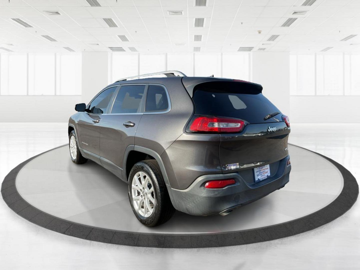2014 Jeep Cherokee Latitude (1C4PJLCS0EW) with an MultiAir2 Tigershark 2.4L I-4 variable valve contr engine, located at 8750 N County Rd 25A, Piqua, OH, 45356, (937) 908-9800, 40.164391, -84.232513 - 2014 Jeep Cherokee Latitude - Photo#4