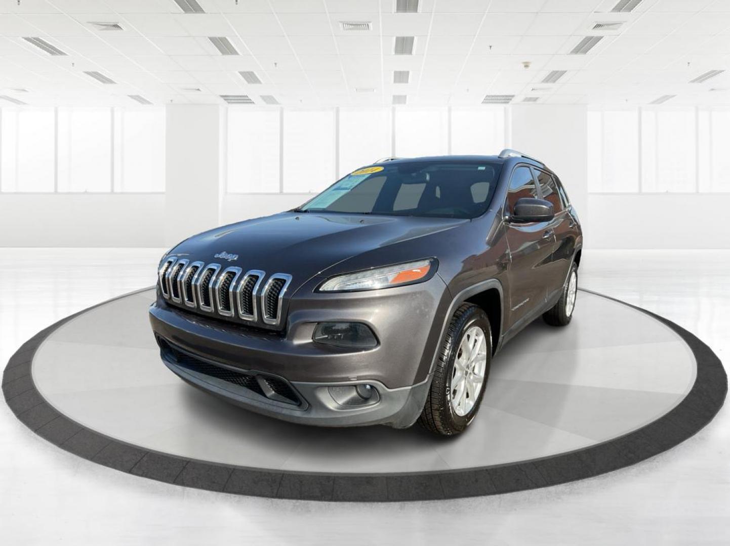 2014 Jeep Cherokee Latitude (1C4PJLCS0EW) with an MultiAir2 Tigershark 2.4L I-4 variable valve contr engine, located at 8750 N County Rd 25A, Piqua, OH, 45356, (937) 908-9800, 40.164391, -84.232513 - 2014 Jeep Cherokee Latitude - Photo#7