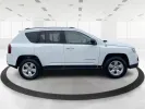 2014 Bright White Clearcoat Jeep Compass Sport FWD (1C4NJCBA9ED) with an 2.0L L4 DOHC 16V engine, located at 880 E. National Road, Vandalia, OH, 45377, (937) 908-9800, 39.891918, -84.183594 - 2014 Jeep Compass Sport FWD - Photo#1