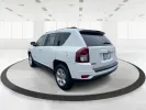 2014 Bright White Clearcoat Jeep Compass Sport FWD (1C4NJCBA9ED) with an 2.0L L4 DOHC 16V engine, located at 880 E. National Road, Vandalia, OH, 45377, (937) 908-9800, 39.891918, -84.183594 - 2014 Jeep Compass Sport FWD - Photo#4