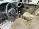 2014 Bright White Clearcoat Jeep Compass Sport FWD (1C4NJCBA9ED) with an 2.0L L4 DOHC 16V engine, located at 880 E. National Road, Vandalia, OH, 45377, (937) 908-9800, 39.891918, -84.183594 - 2014 Jeep Compass Sport FWD - Photo#8